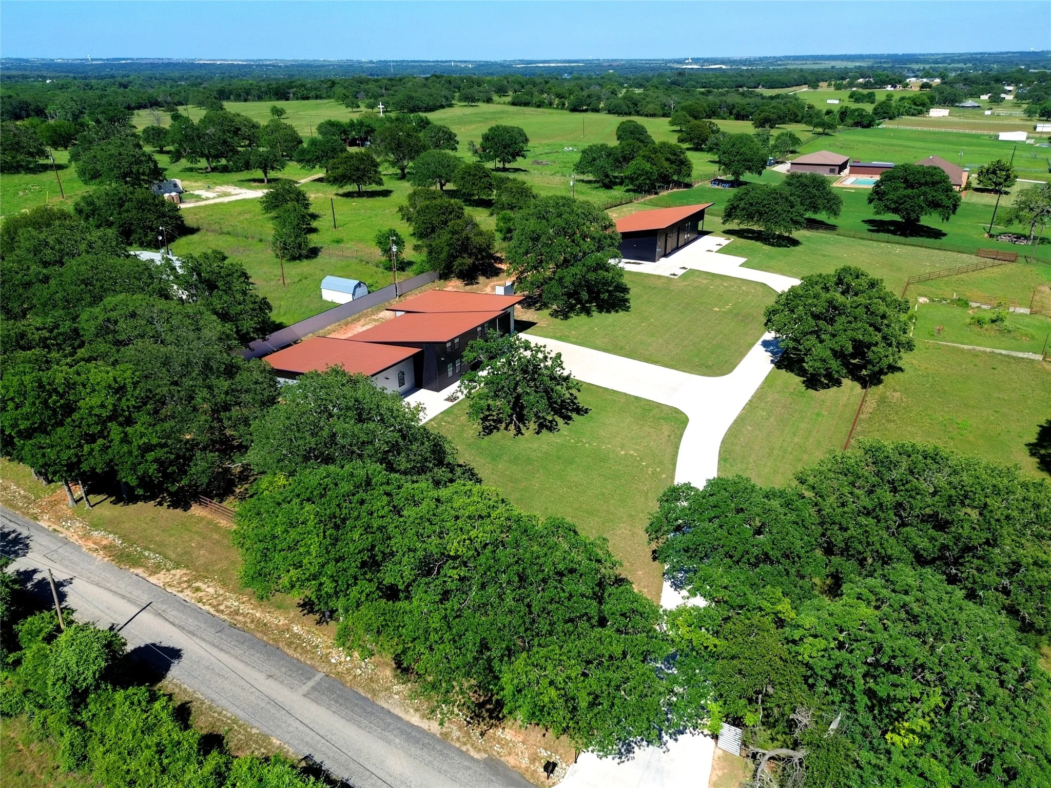 Primary home is toward the left, secondary is beyond. Eagle Mountain Lake with boating and recreational opportunities is just beyond view, less than a half-mile.