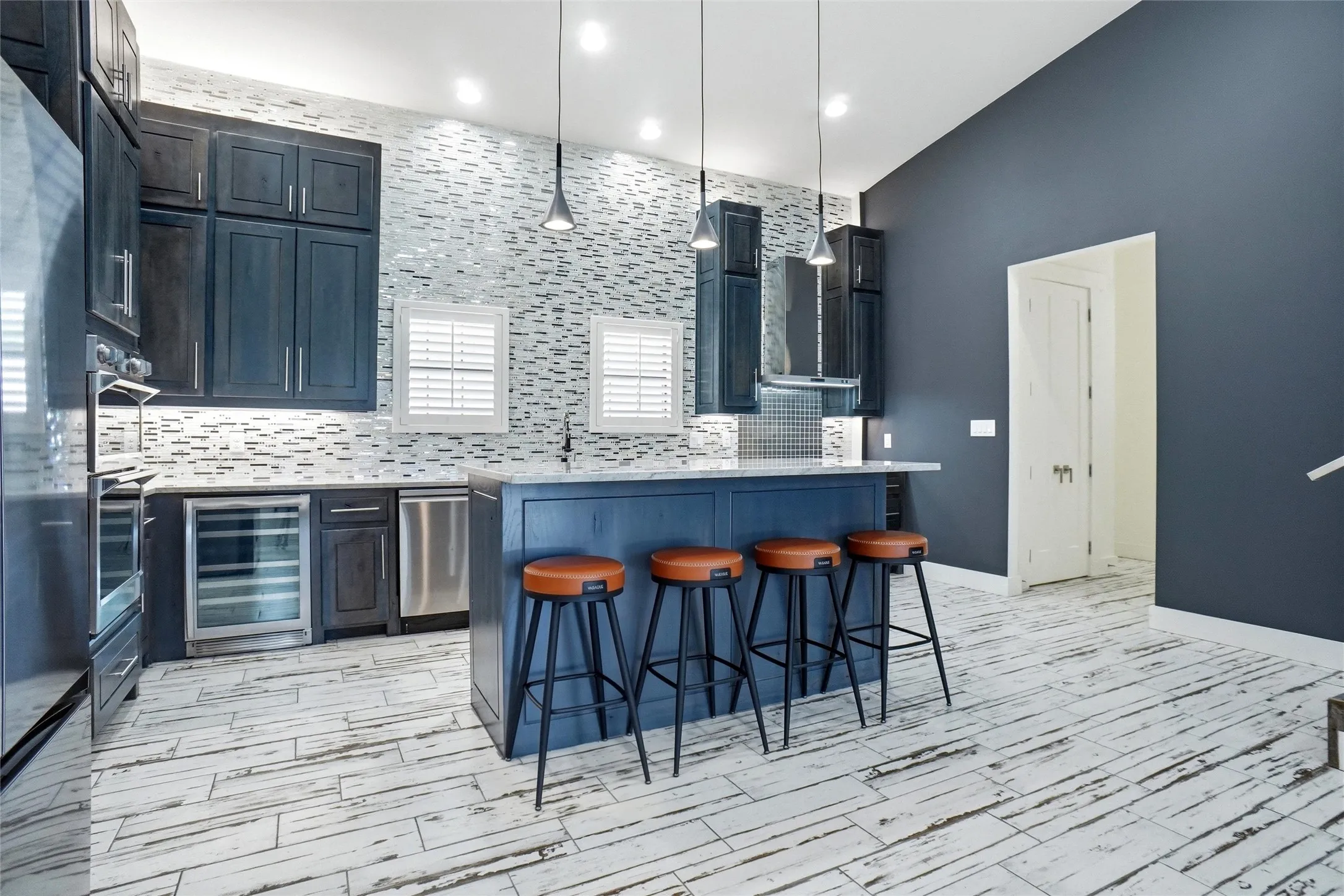 Every possible convenience in this kitchen, including induction and convection, two dishwashers and a beverage cooler.