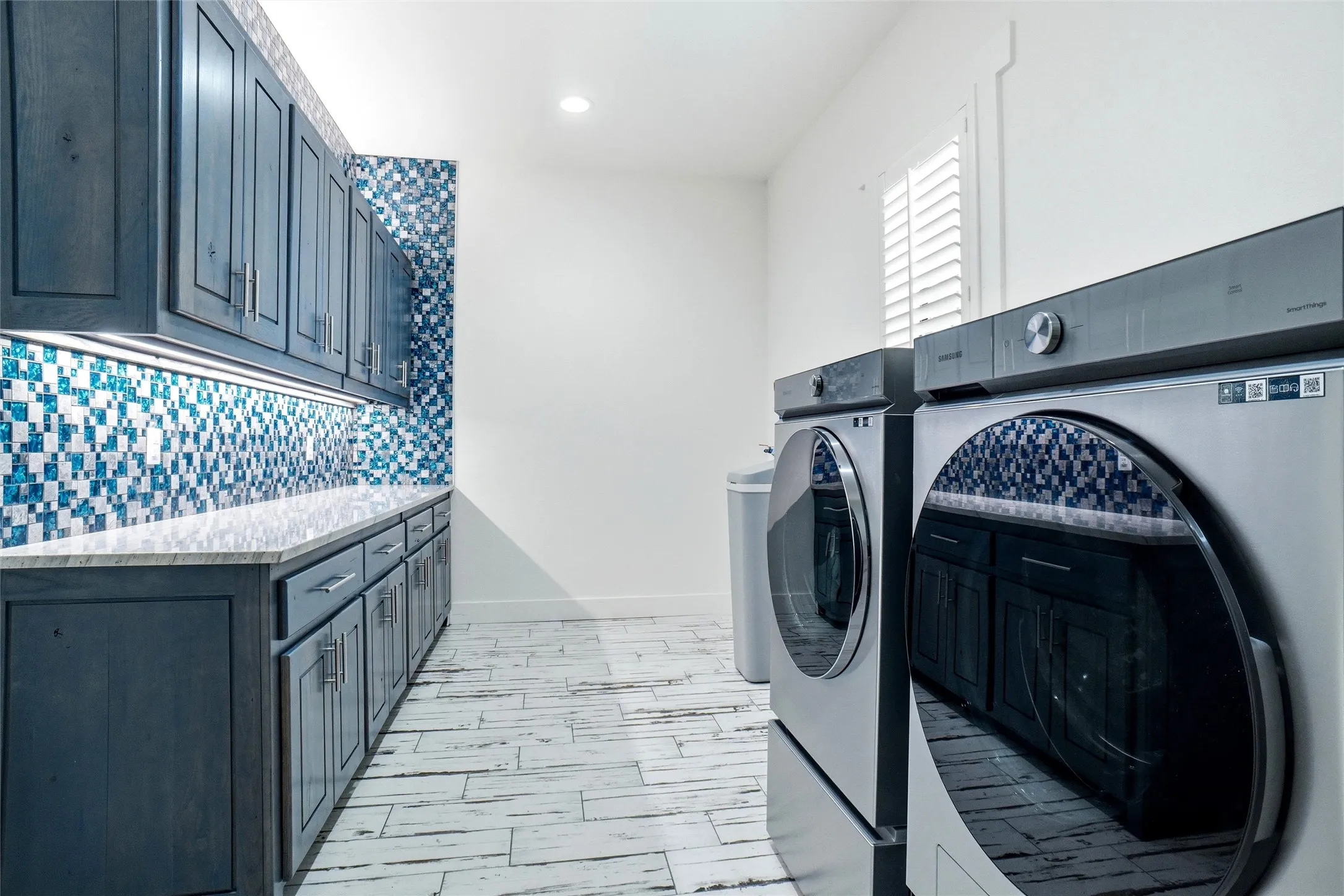 Main house laundry area. All appliances can convey.