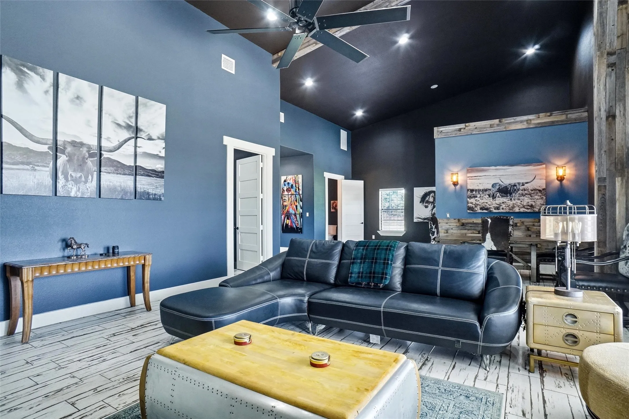 Living area in secondary residence; kitchen is far left and bedroom is near left. ALL FURNISHINGS AND ACCESSORIES CAN CONVEY.