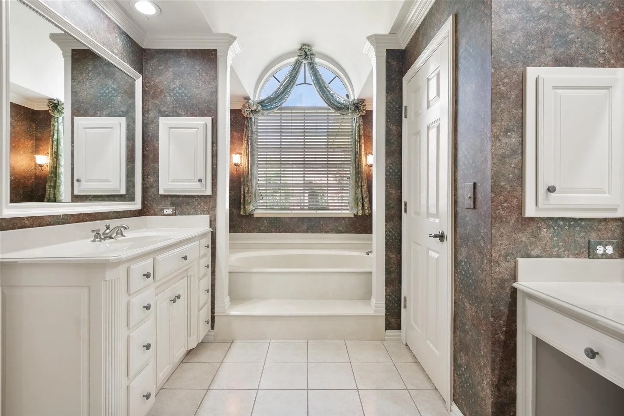 Primary bath with barrel ceiling.
