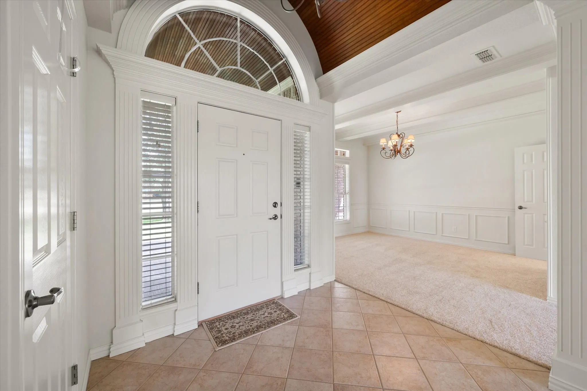Foyer with barrel ceiling.