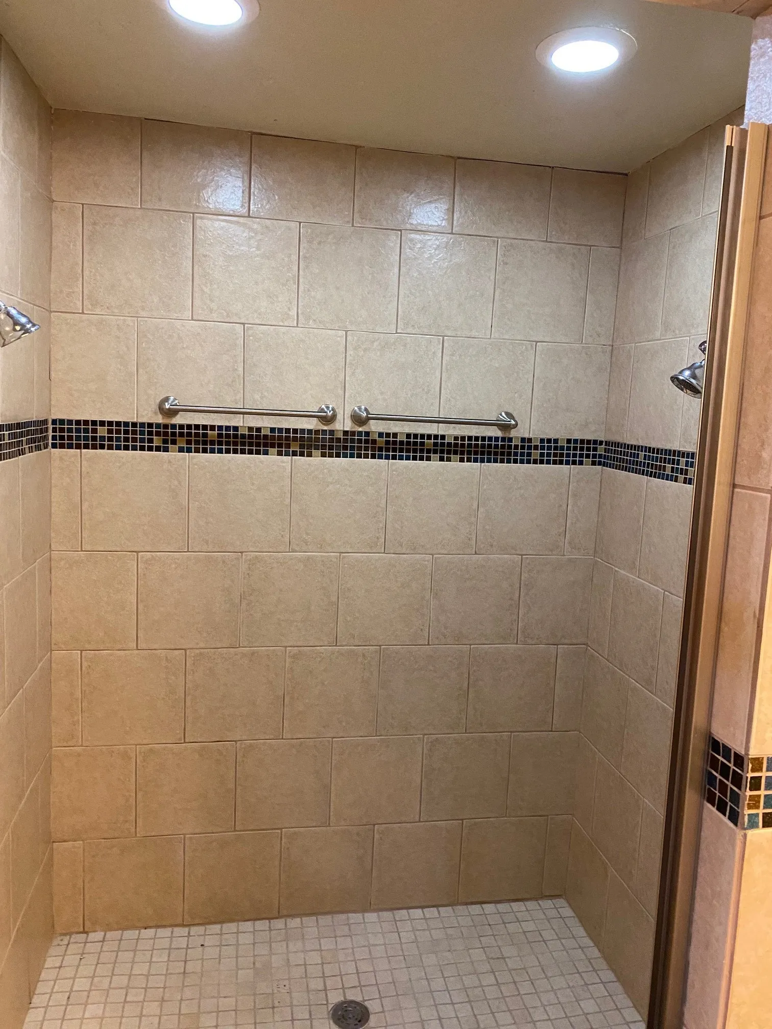 Guest Shower with Double shower heads, one on right and left.