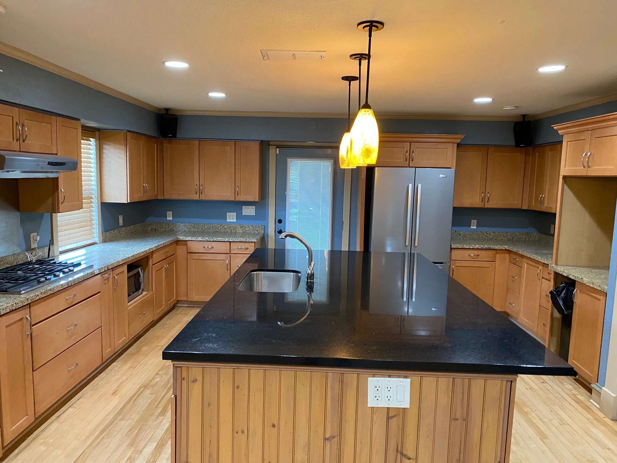 Kitchen Island looking toward refrigerator.