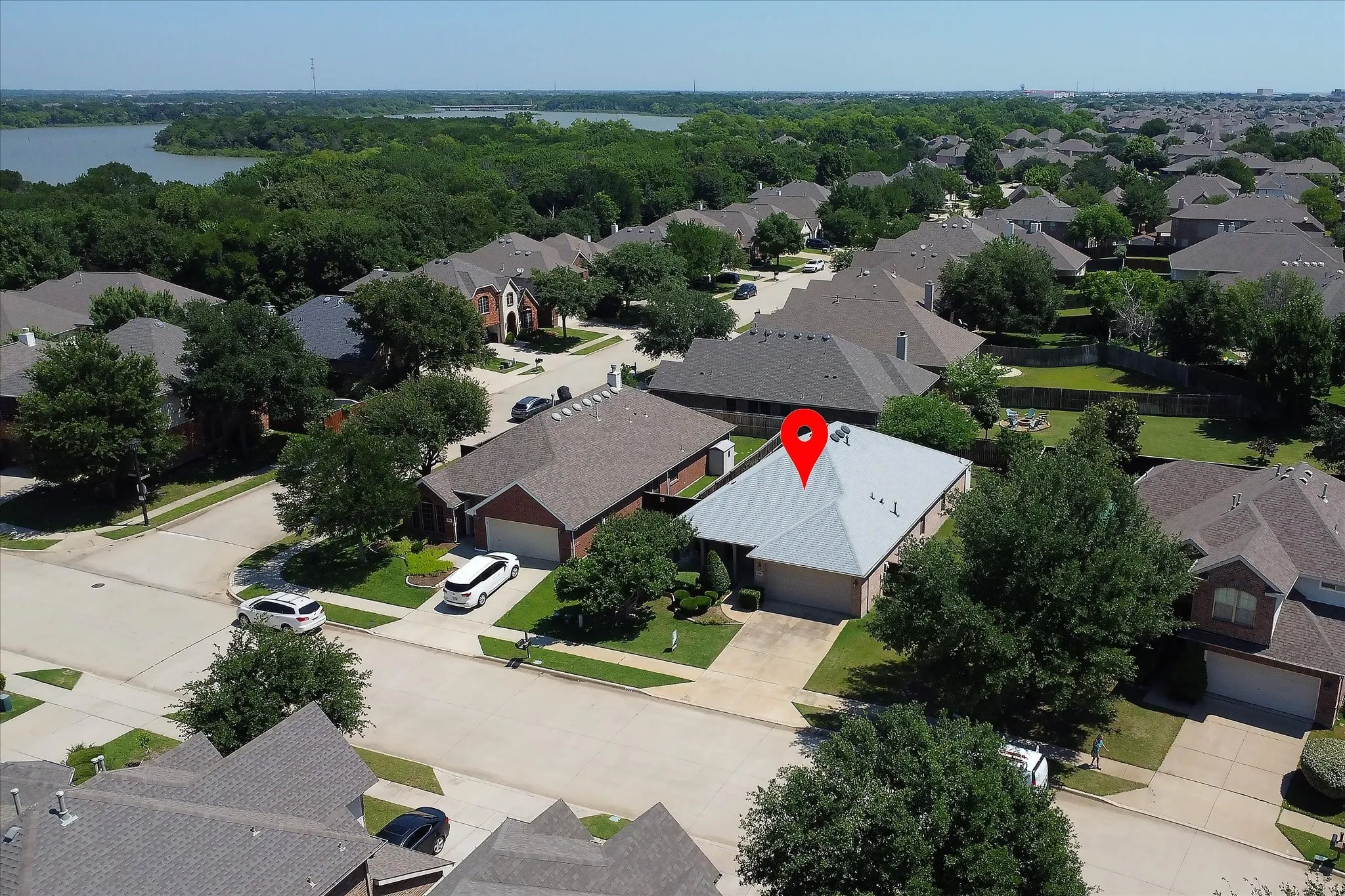 Property is located minutes from Lake Lewisville walking trails, and community pool with clubhouse event center and playground is a block down the street.