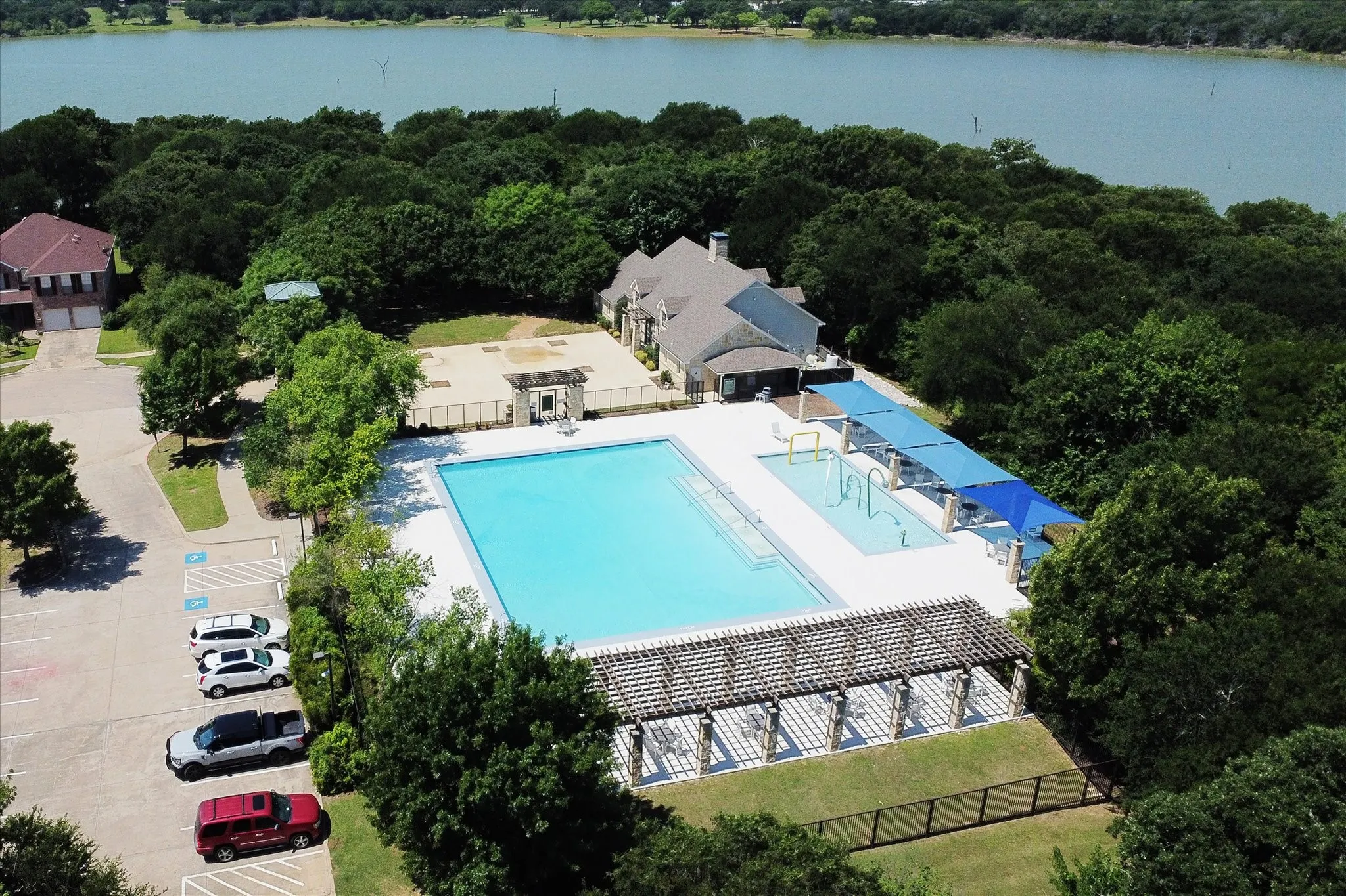 This pool & clubhouse are just a block away. That's Lake Lewisville behind the trees!
