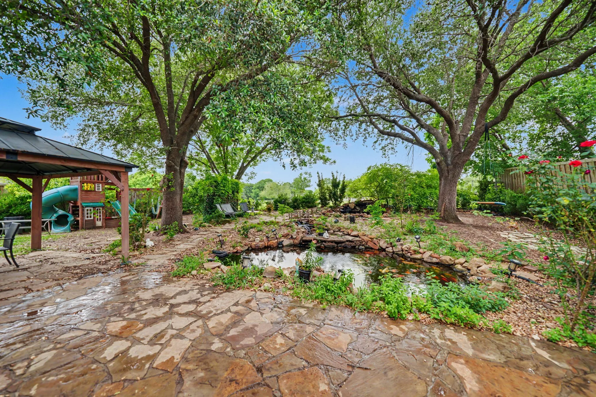 Koi Pond's in this beautiful backyard setting