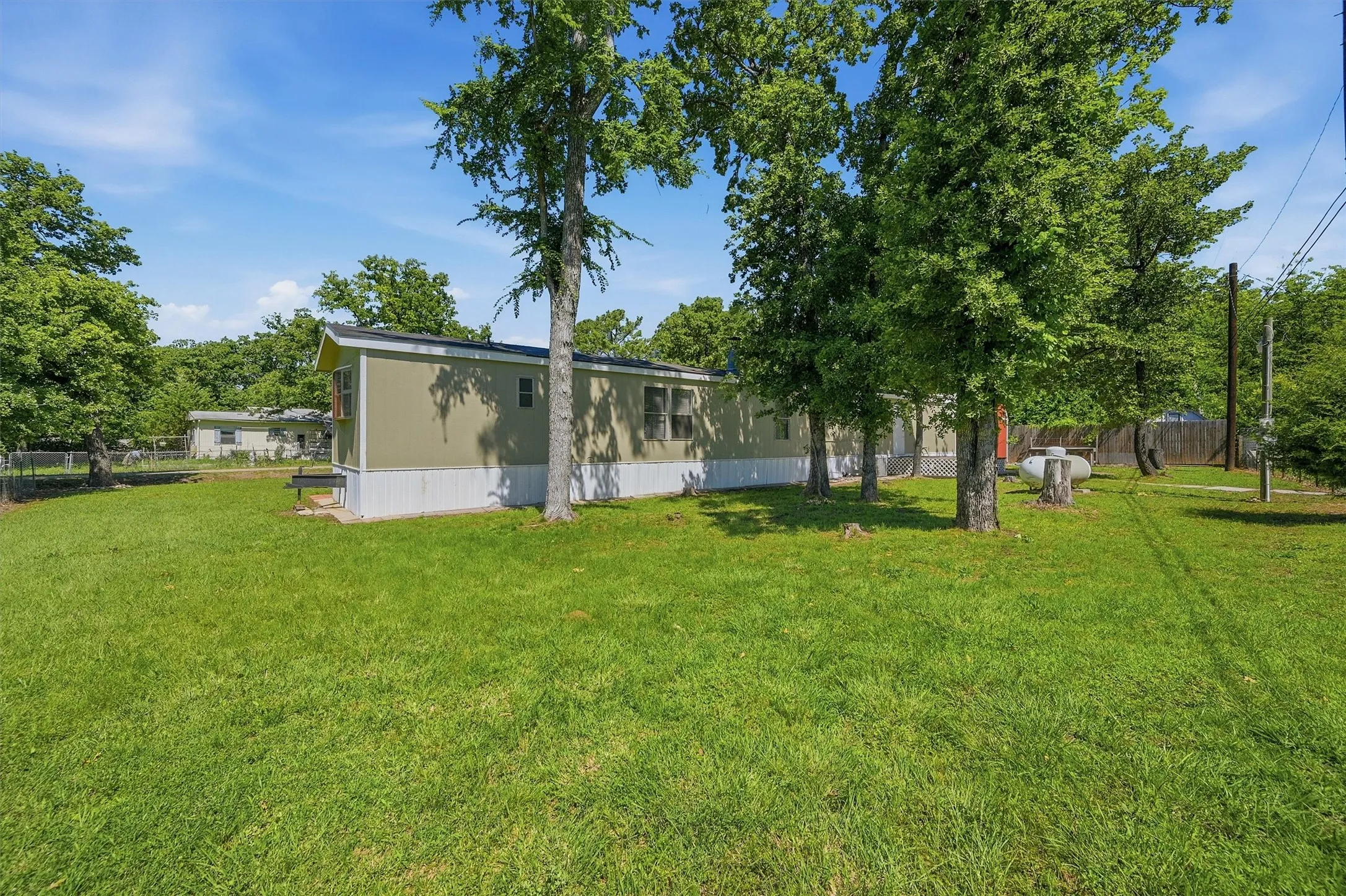 Spacious green lawn surrounding the property