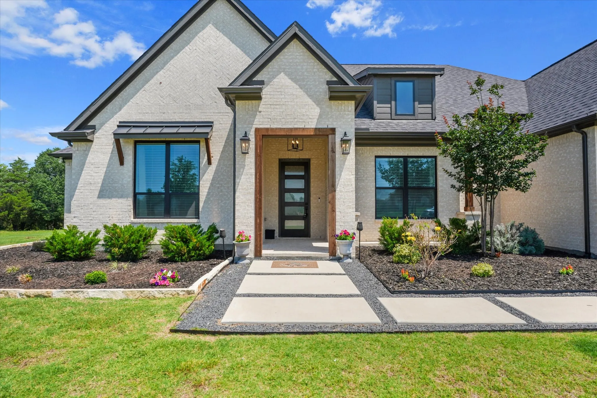 White brick exterior with dark trim accents