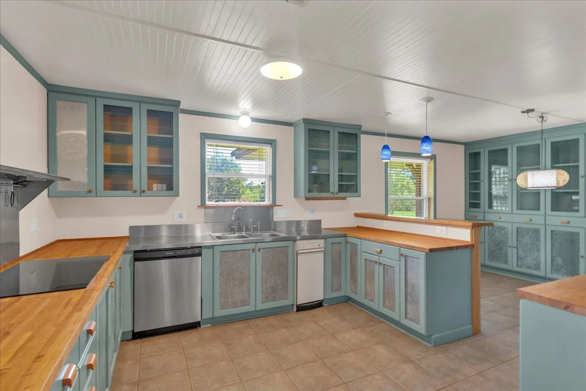 Super cute kitchen with so much prep space!