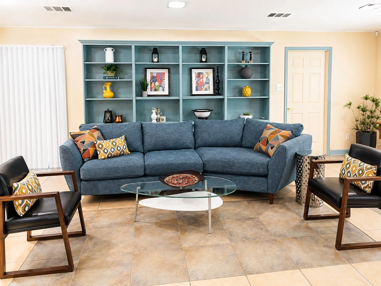 Huge living room with built-in bookshelves.