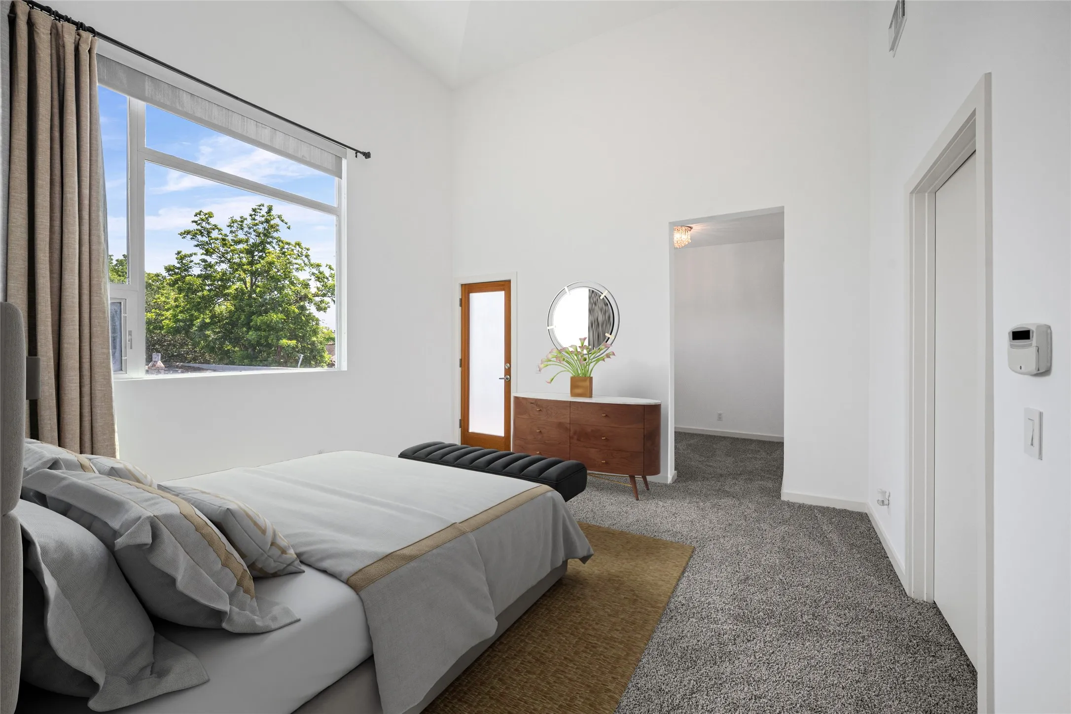VIRTUALLY STAGED! Vaulted ceilings and a large picture window define this spacious room
