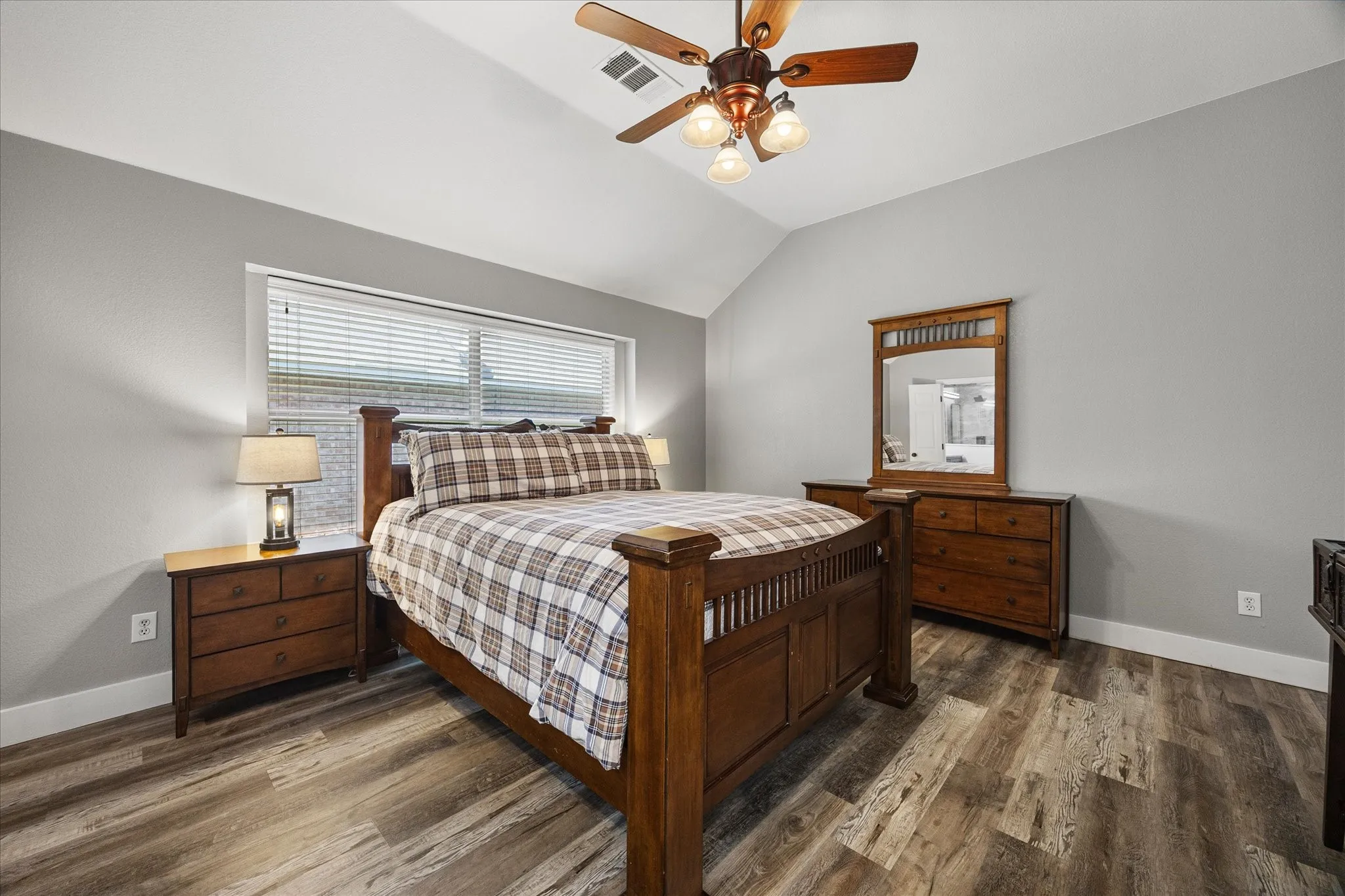 The spacious primary suite is split for privacy.