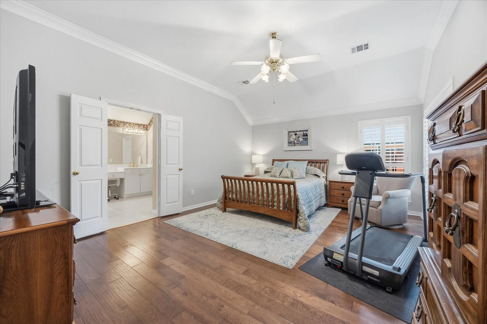 The spacious primary retreat is split for privacy.