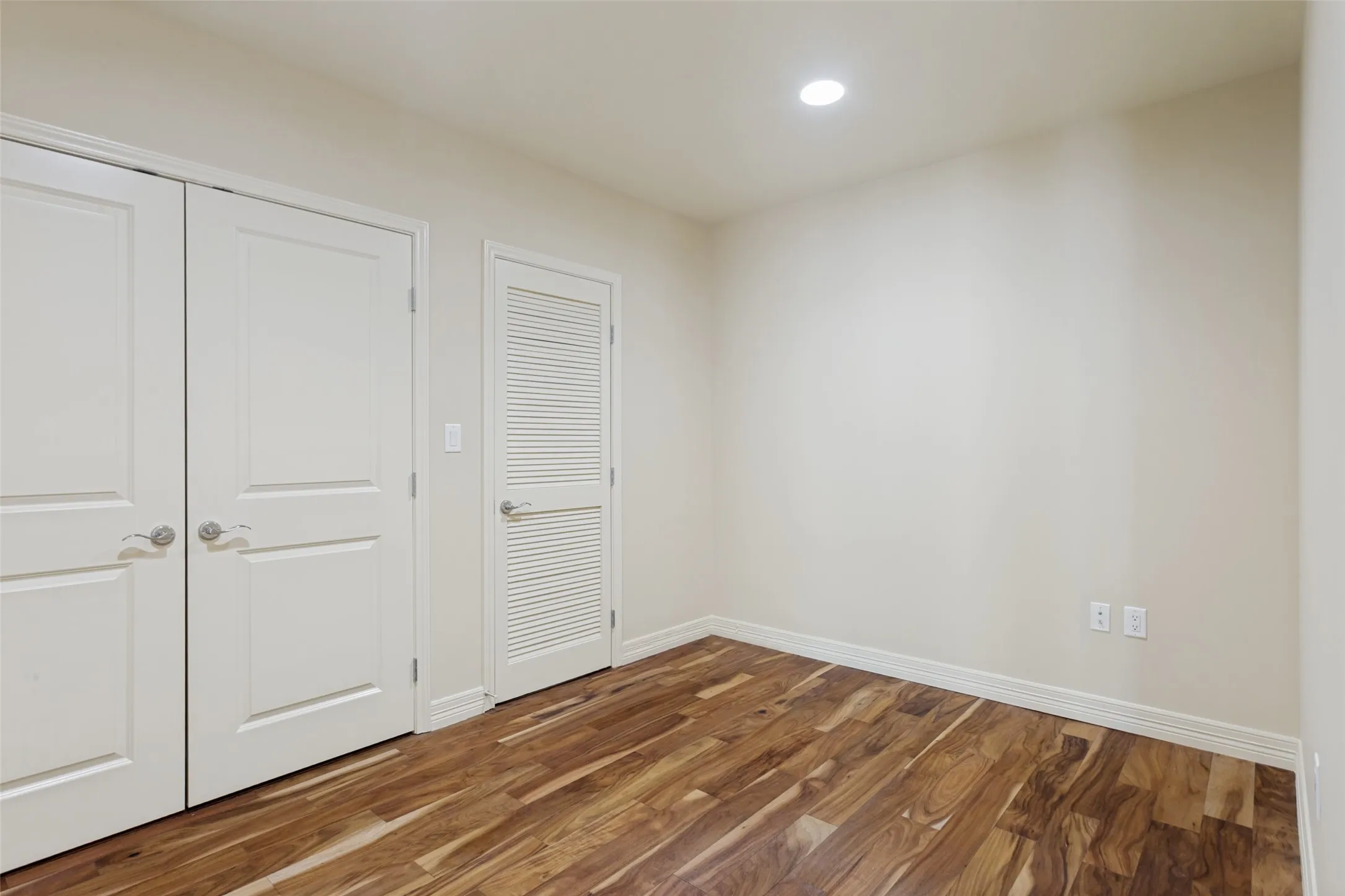 Den or office . Laundry closet as well as extra storage closet.