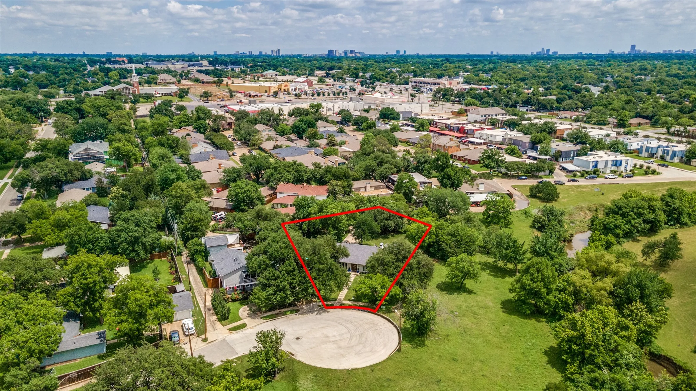 Tucked away on a quiet cul-de-sac, this home offers a uniquely private setting while remaining minutes from premier Dallas conveniences.