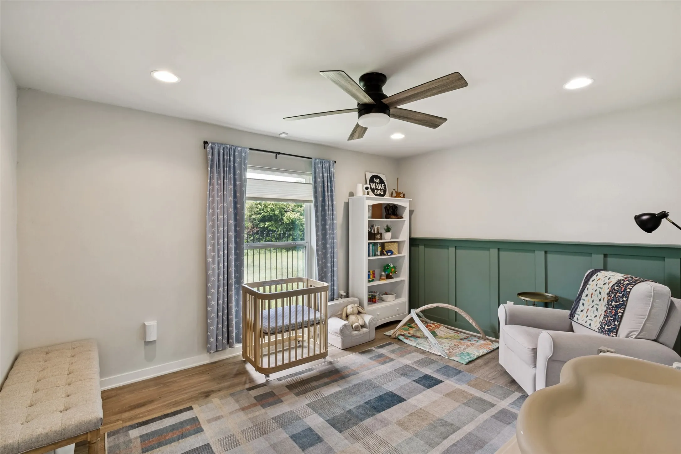 Renovated with designer touches, this bedroom offers direct and convenient access to a guest bathroom.