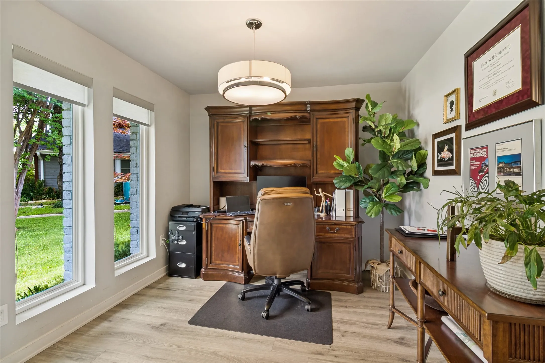 Dedicated office space with closet, offers exceptional flexibility as a fourth bedroom or playroom.