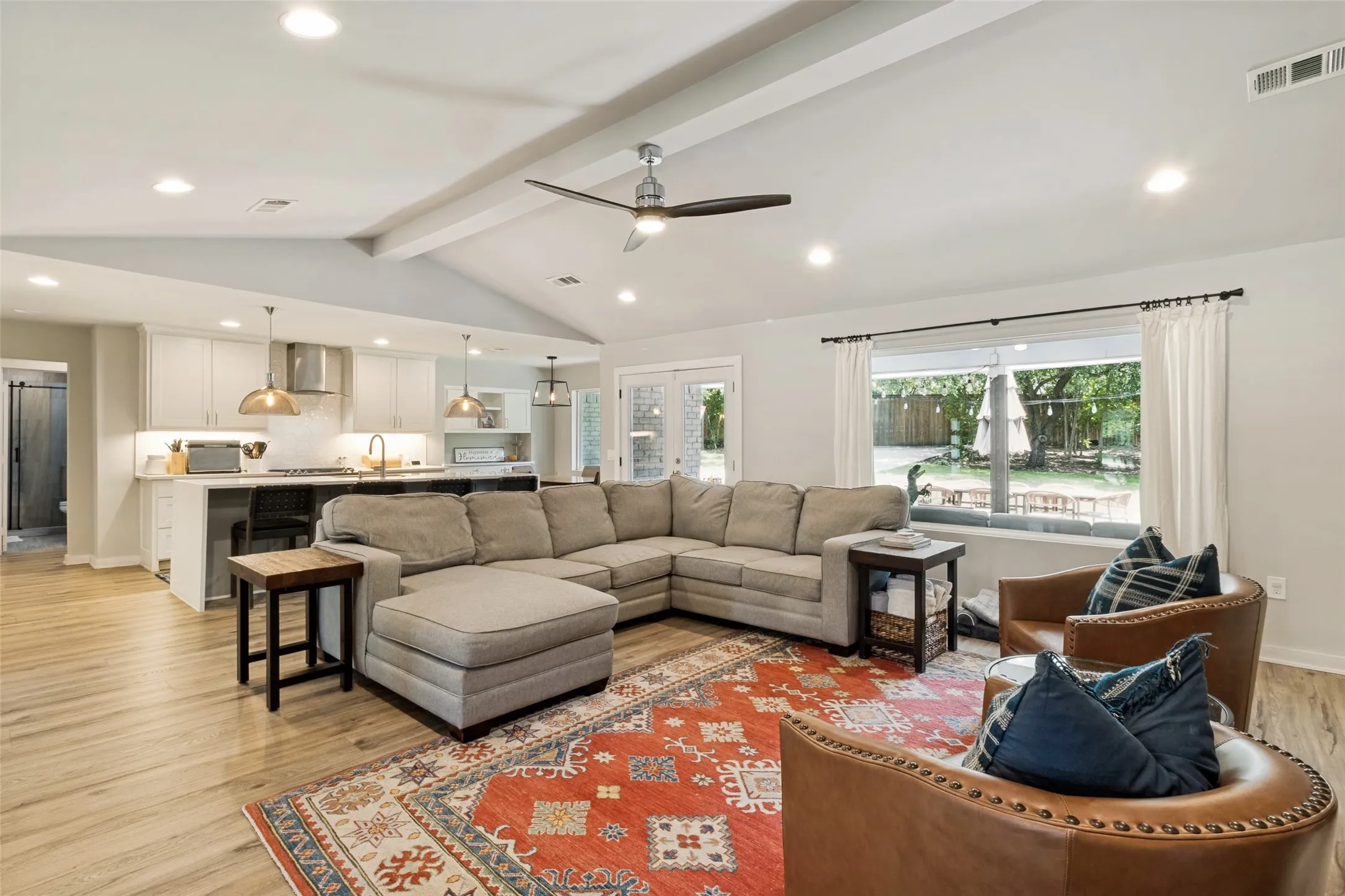 Spacious main living area offers flexible furniture layout options and seamless indoor-outdoor connection to the backyard.