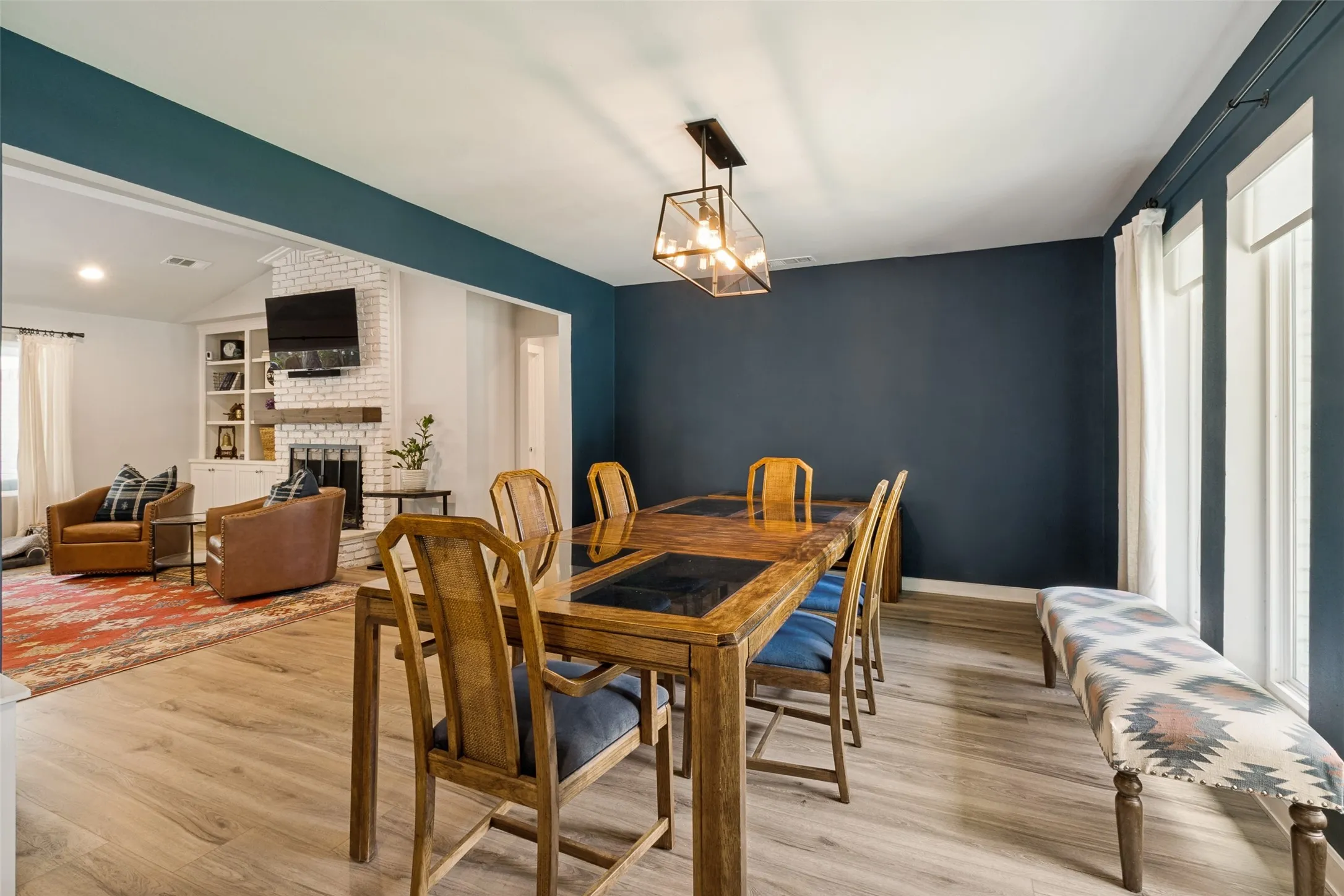 Abundant natural light shines through new windows.