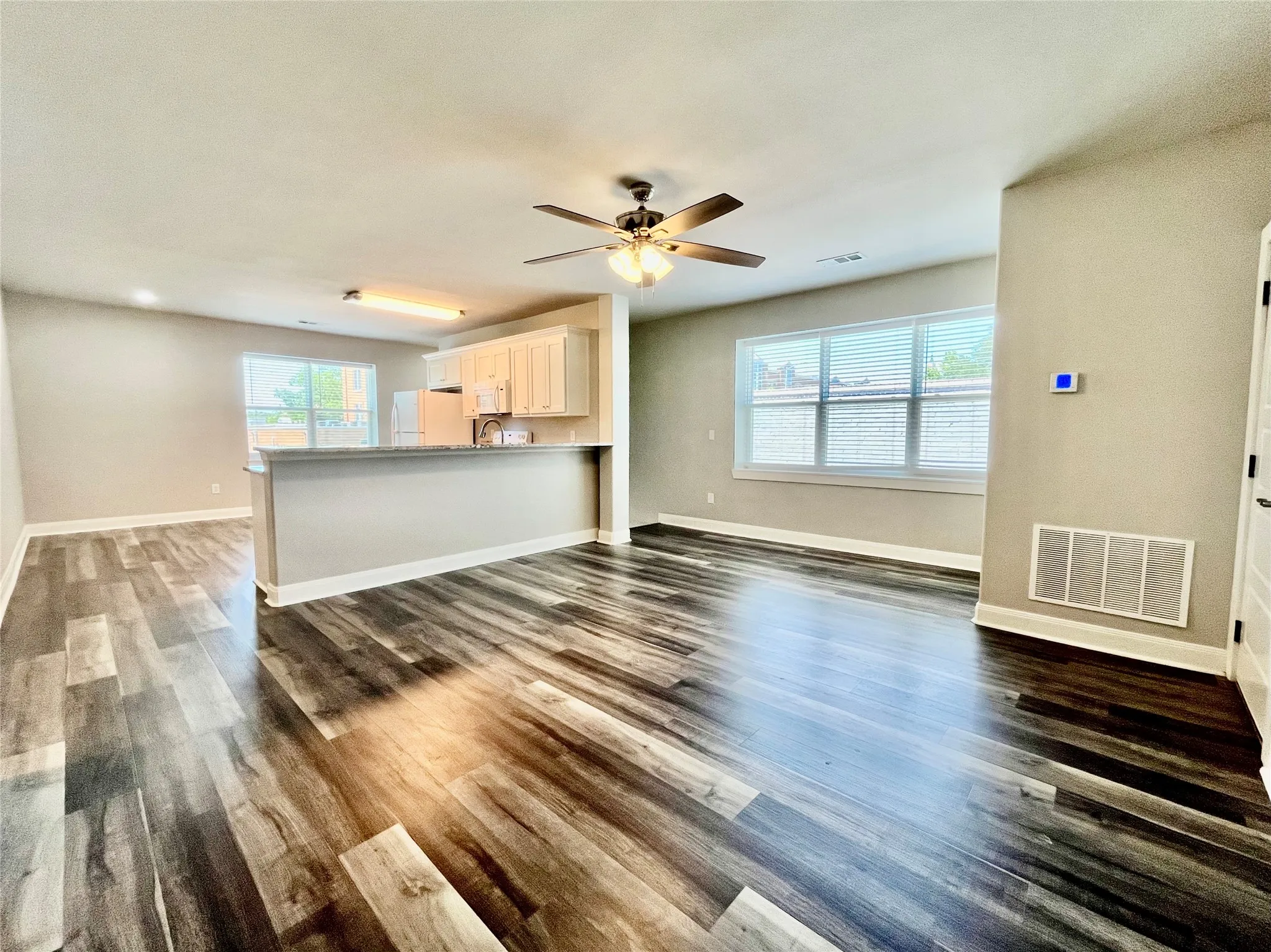 The open-concept layout fills the main living space with great natural light.