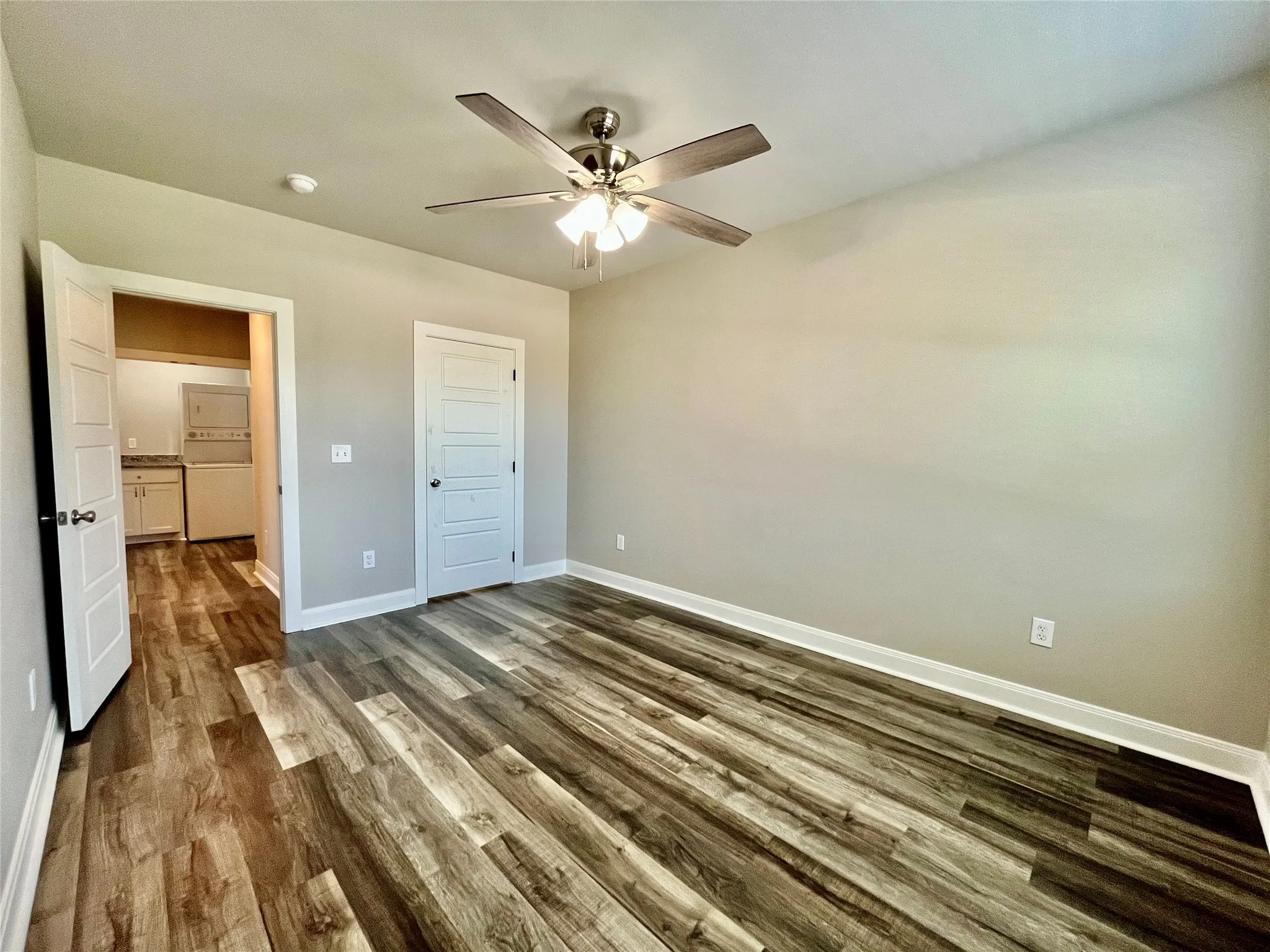 Versatile bedroom layout with beautiful flooring that flows seamlessly throughout.