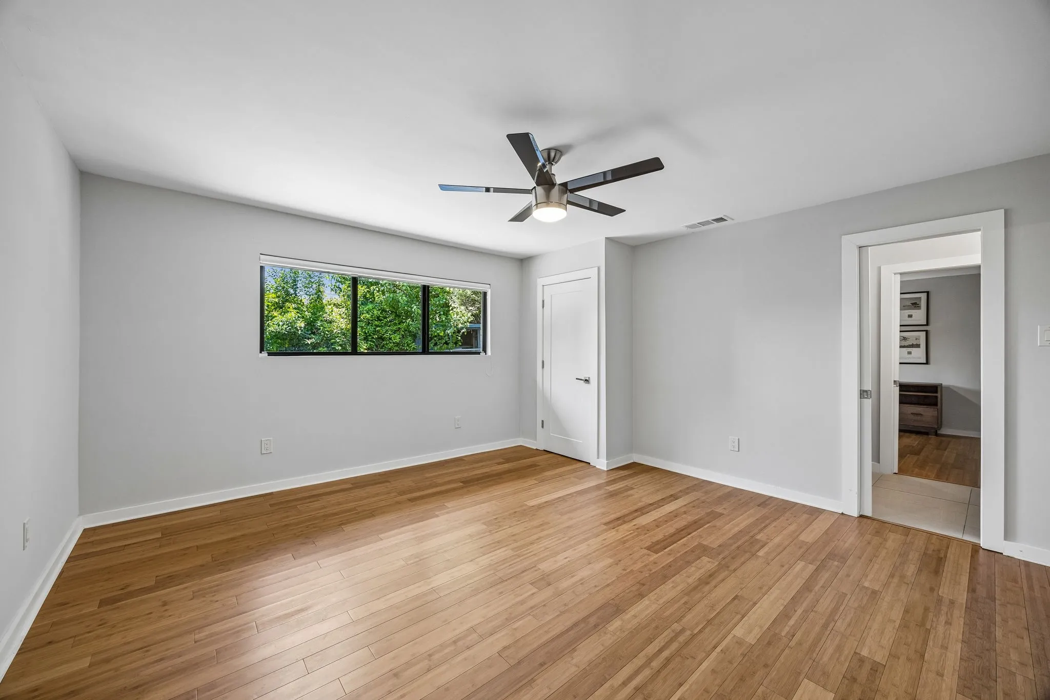 Guest bedroom near rear of the home