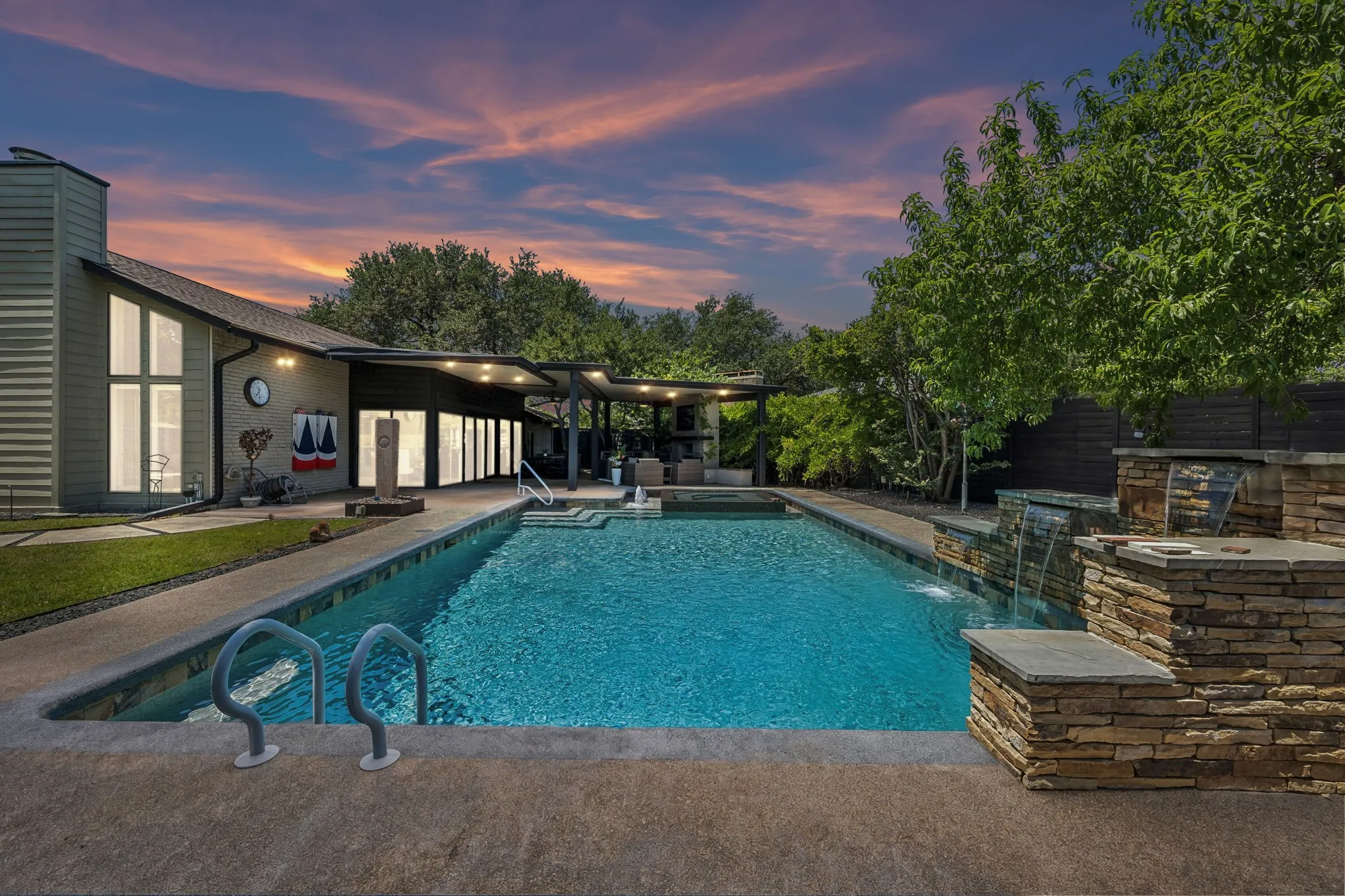 Dreamy backyard with yard space, pool, and covered patio!