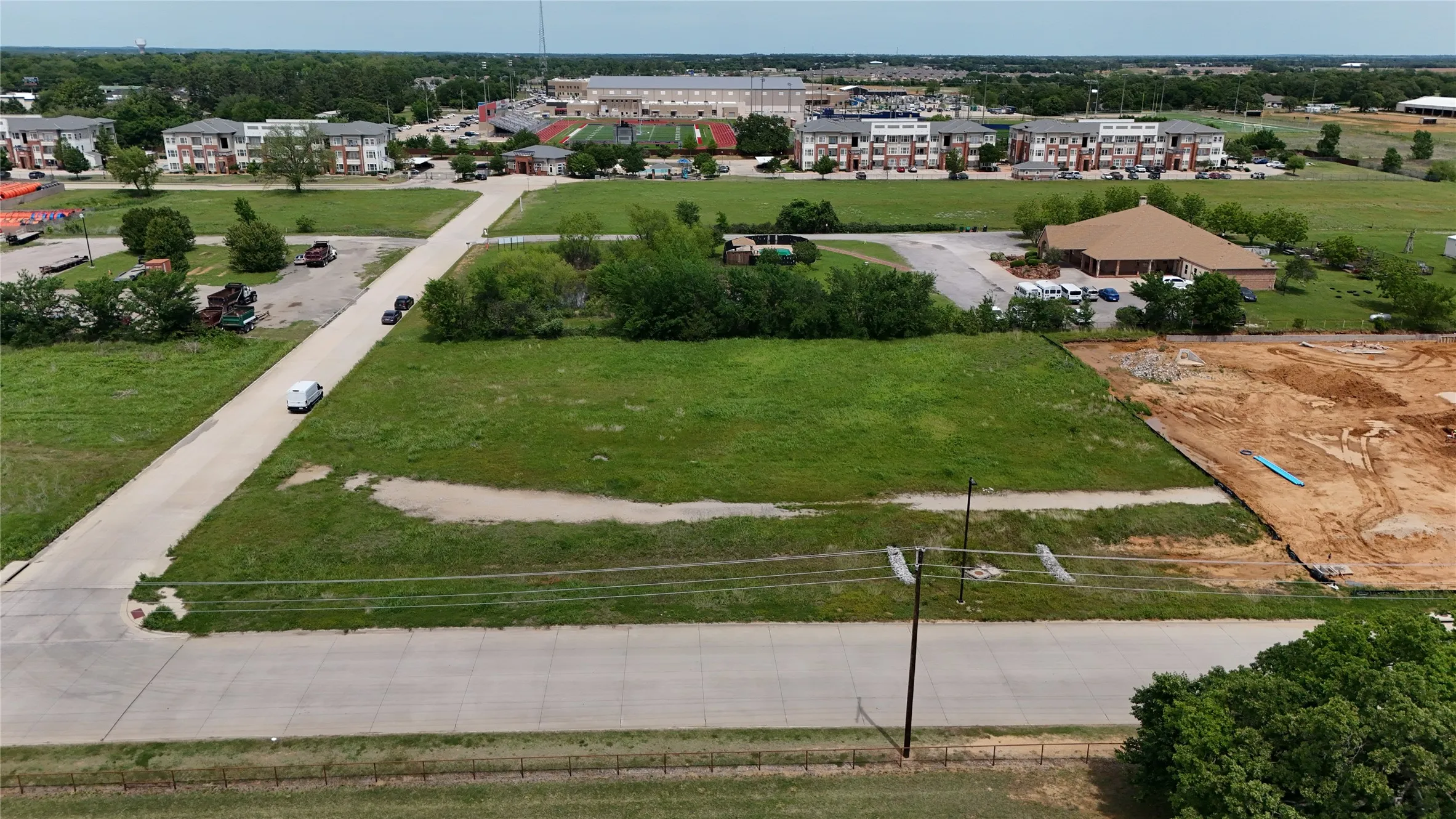 Expansive undeveloped land parcel with direct road frontage