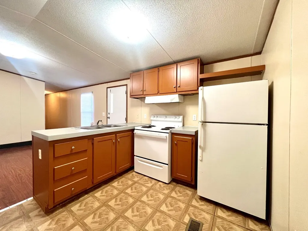 Mobile Home For Sale in Henderson County , 304 Wildwind Street, Gun Barrel City, Texas 75156, 3 Bedrooms, 1 Bathroom, Garage spaces, 754 Sqft, built in 2005, Price $119,900, mls#21269052, Real Estate Agent in Gun Barrel City, Homes For Sale in Henderson county, Homes For Sale in Gun Barrel City, Realtor in Gun Barrel City Texas, Real Estate Brokerage Independent Realty Texas, Luminita Cordes Realtor