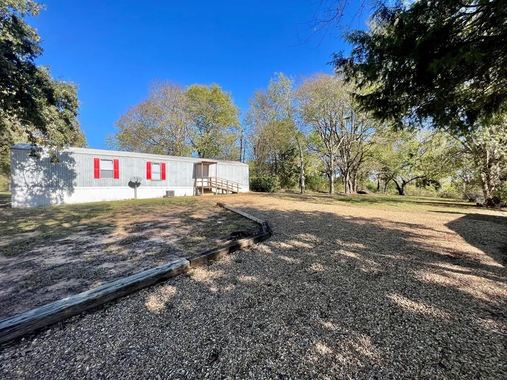Mobile Home For Sale in Henderson County , 304 Wildwind Street, Gun Barrel City, Texas 75156, 3 Bedrooms, 1 Bathroom, Garage spaces, 754 Sqft, built in 2005, Price $119,900, mls#21269052, Real Estate Agent in Gun Barrel City, Homes For Sale in Henderson county, Homes For Sale in Gun Barrel City, Realtor in Gun Barrel City Texas, Real Estate Brokerage Independent Realty Texas, Luminita Cordes Realtor