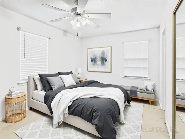 Virtual Staging in Primary Bedroom featuring ceiling fan