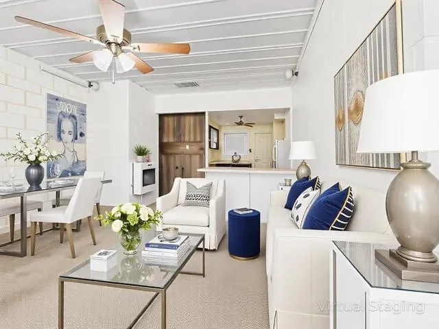 Virtual Staging Living area featuring visible vents and ceiling fan