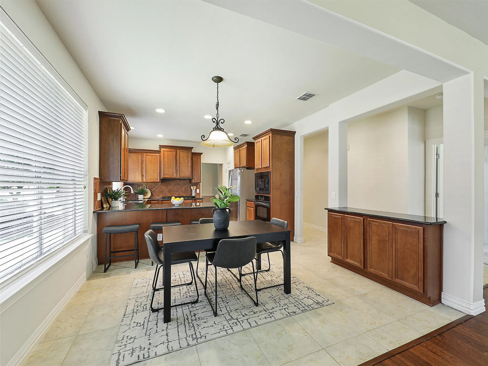 Dining area featuring recessed lighting and baseboards
