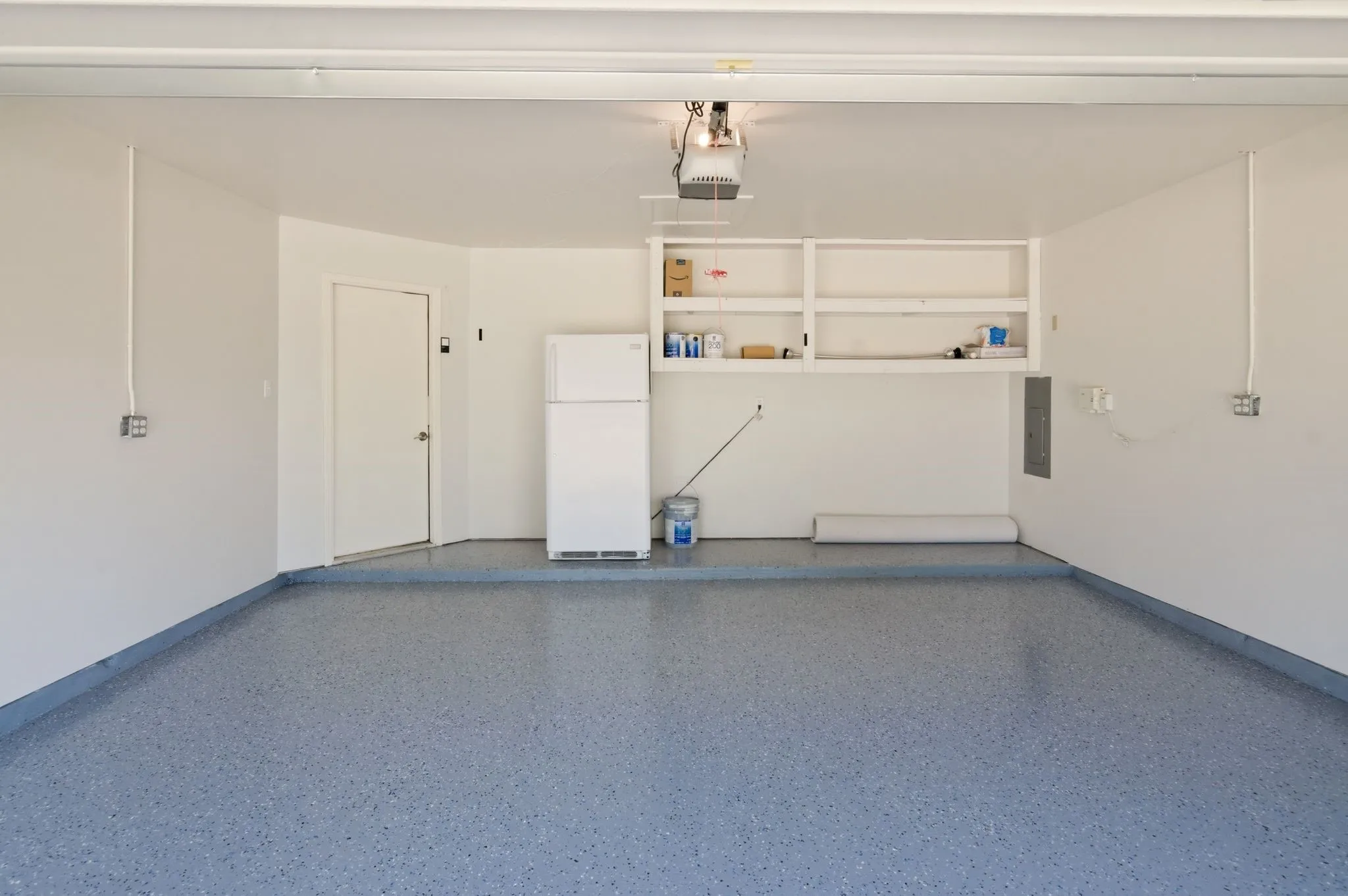 Freshly Painted Garage Walls and treated Floor