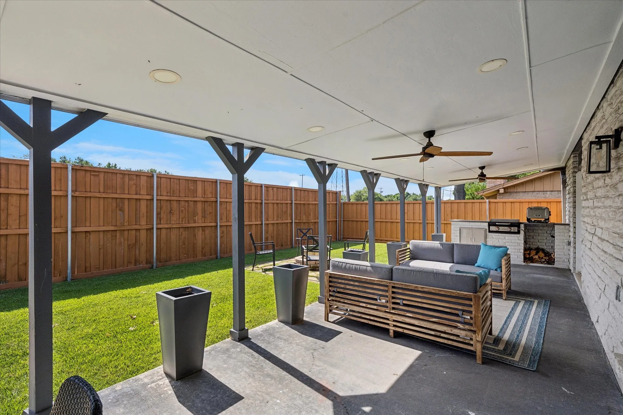 Covered patio runs the length of the house!