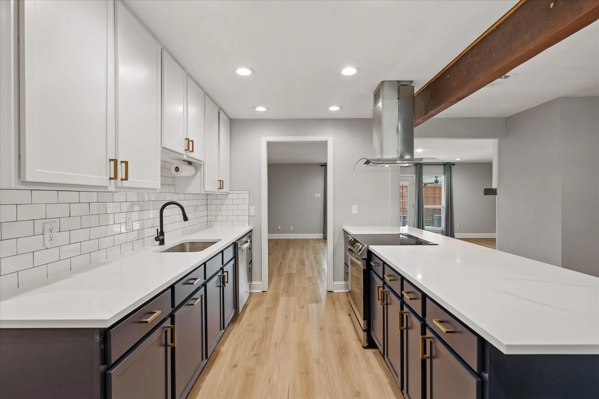 New Quartz countertops and single bowl stainless steel sink