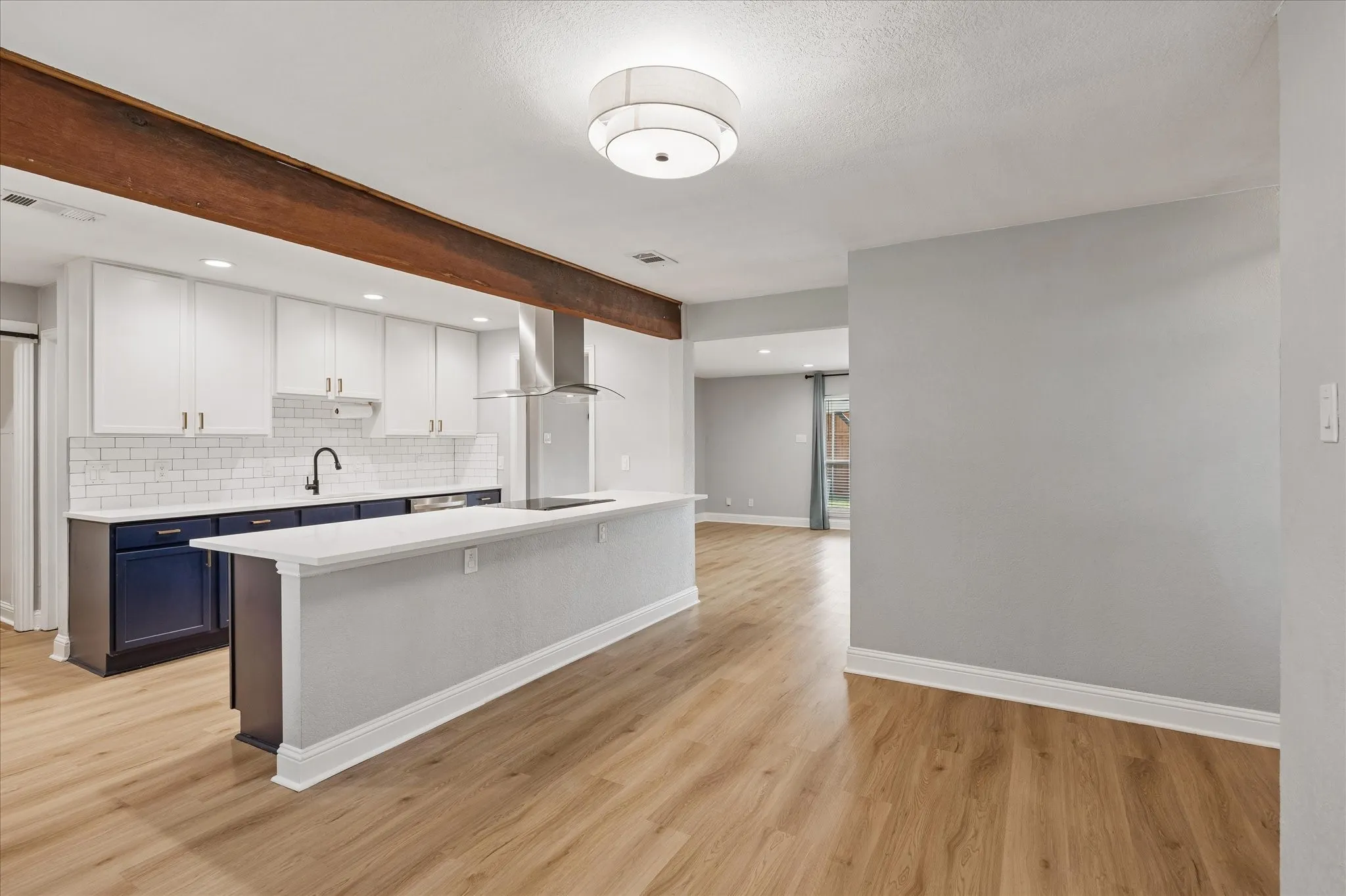 New Quartz Countertops! Stunning over blue painted cabinets!