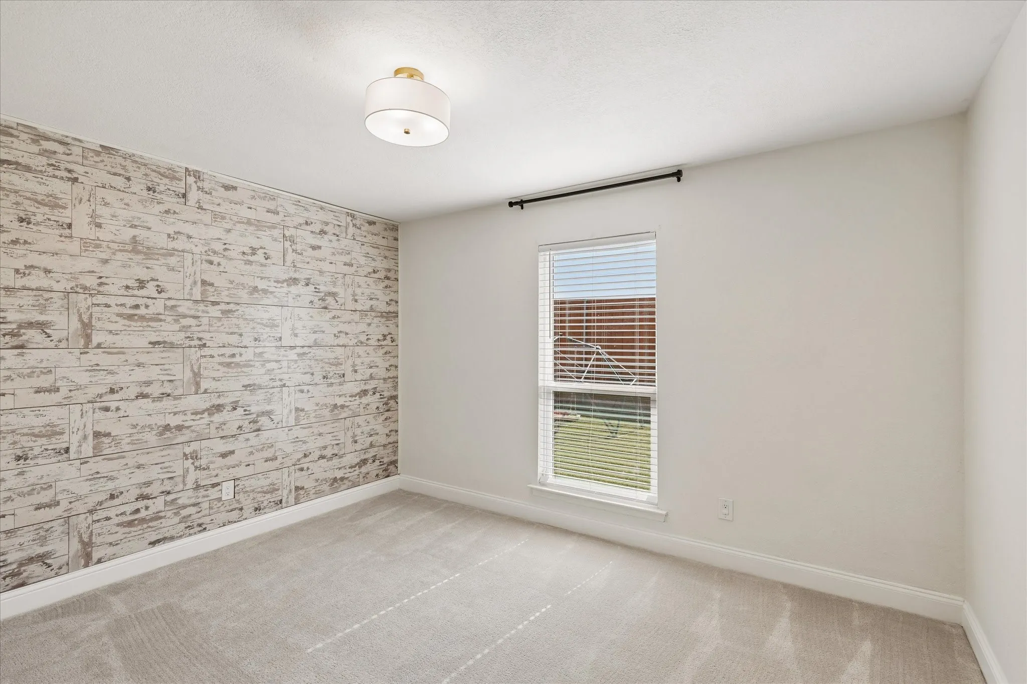 One of three secondary bedrooms - or office, flex space!