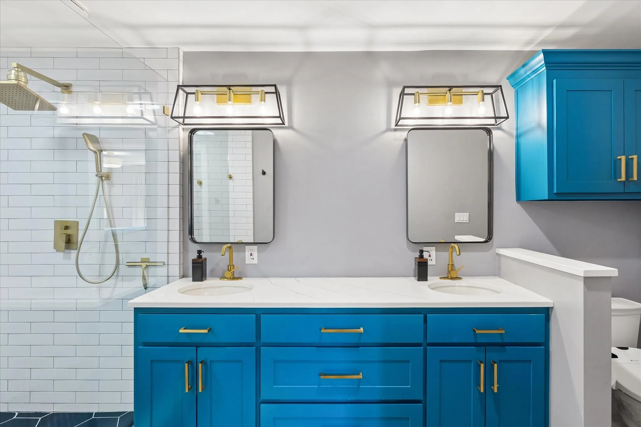Primary bathroom with dual sinks and large shower