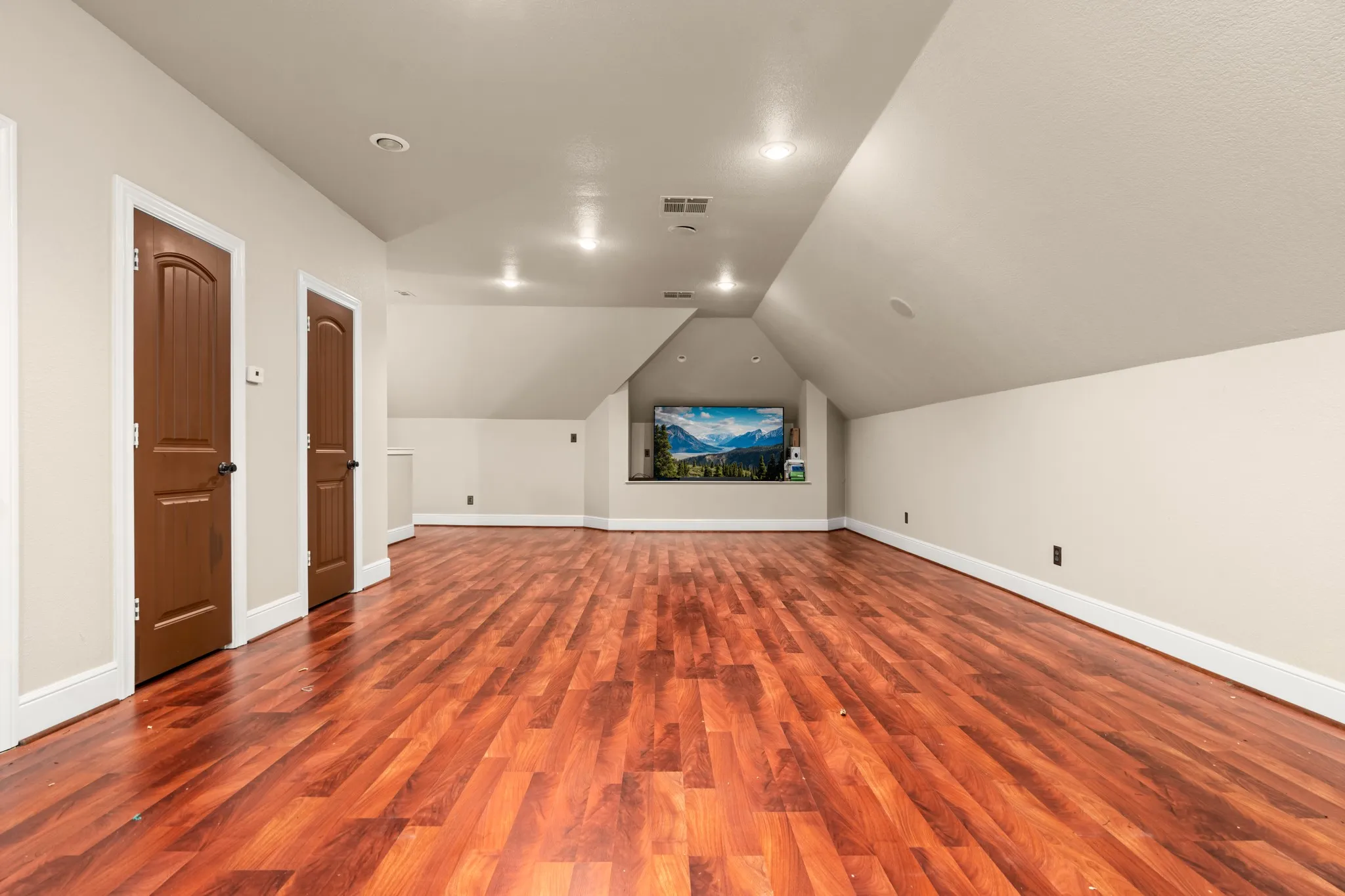 5th bedroom upstairs media room with closets