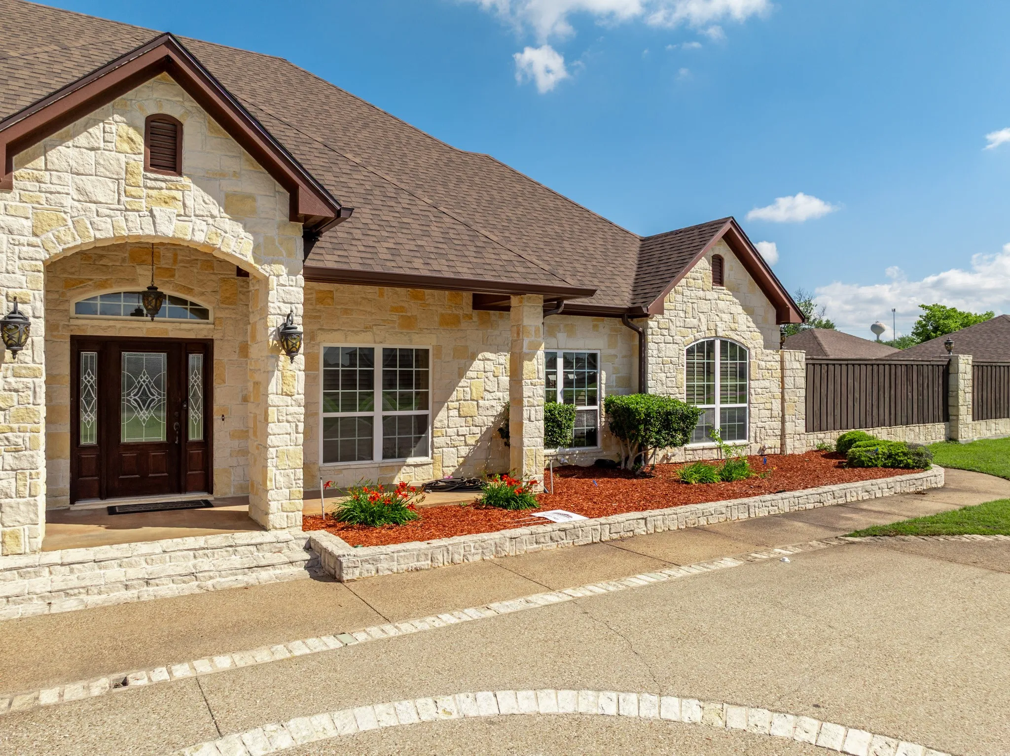 Main house entry with lighted circle drive
