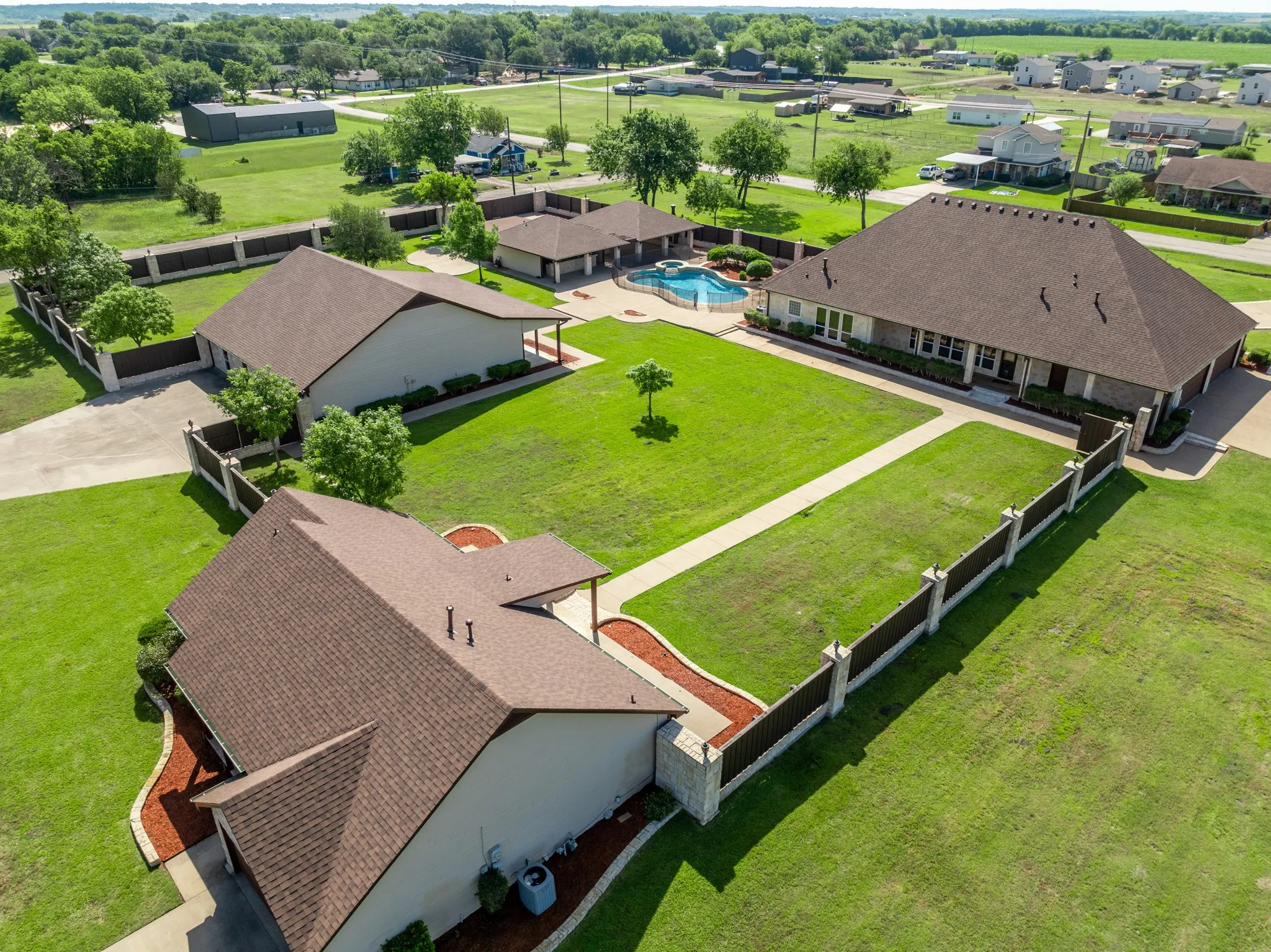 Main house with 4 car garage and entry on King St, 2nd home, Event house, and covered pavillion with outdoor kitchen.