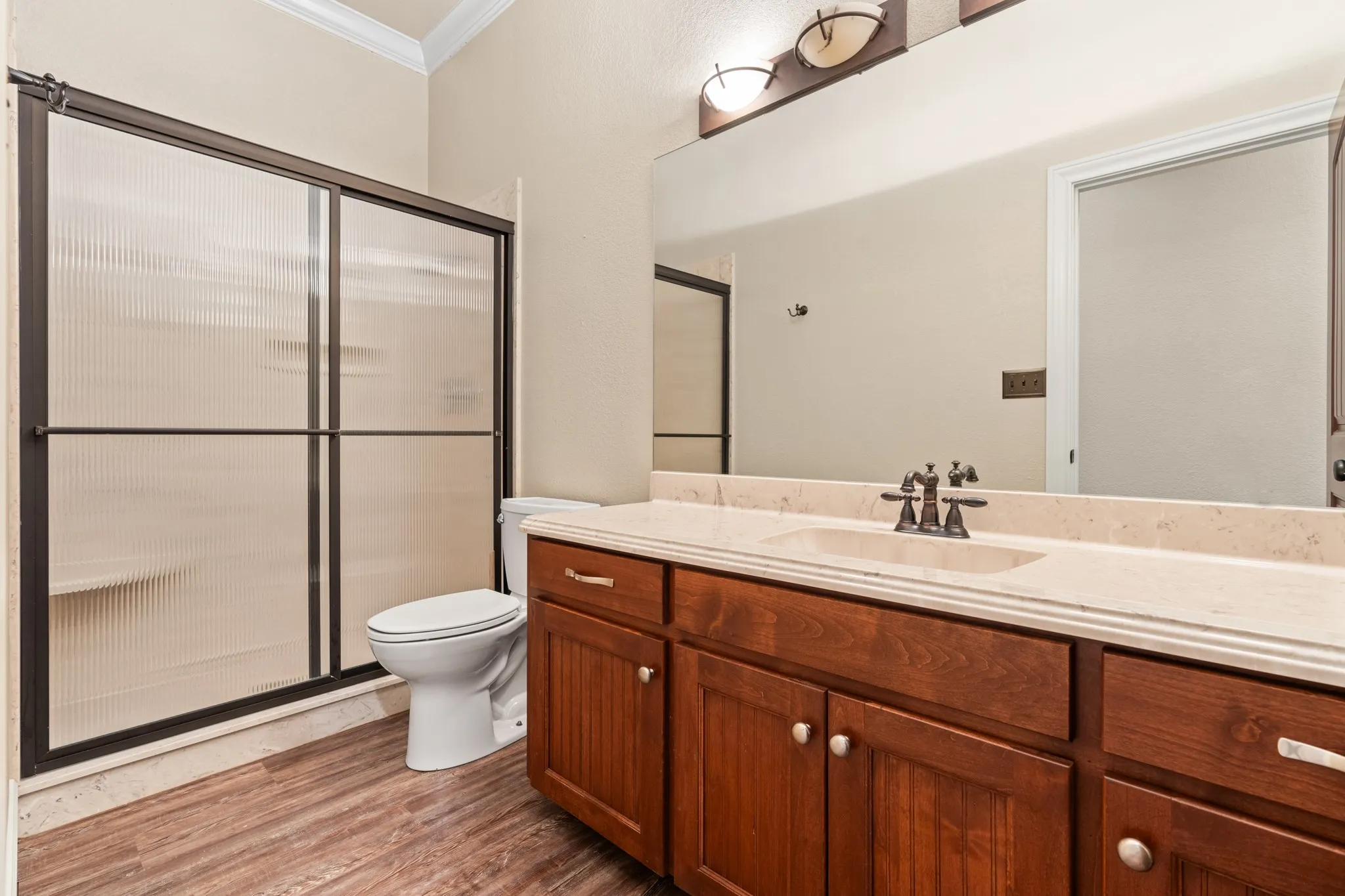 Hall bathroom serving main home bedrooms.