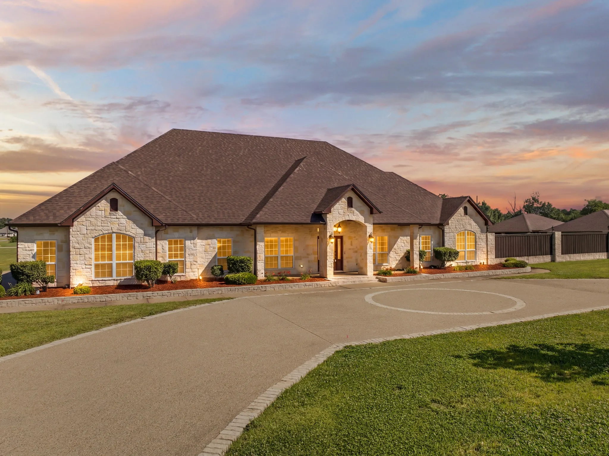 Main Home Entry with circle drive.  3646 Sq. ft 5 bed 3 full bath with 4 car attached garage