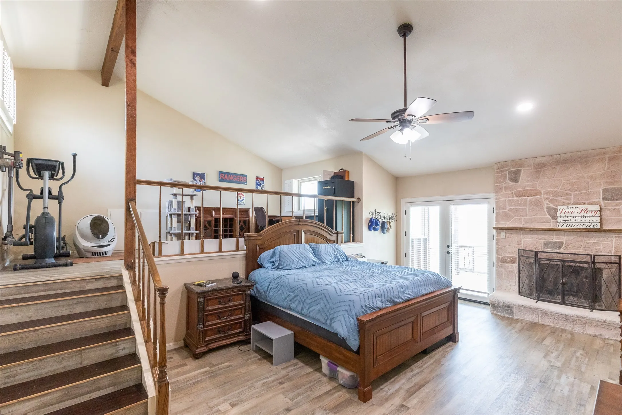 Unique and spacious Primary Bedroom with fireplace.