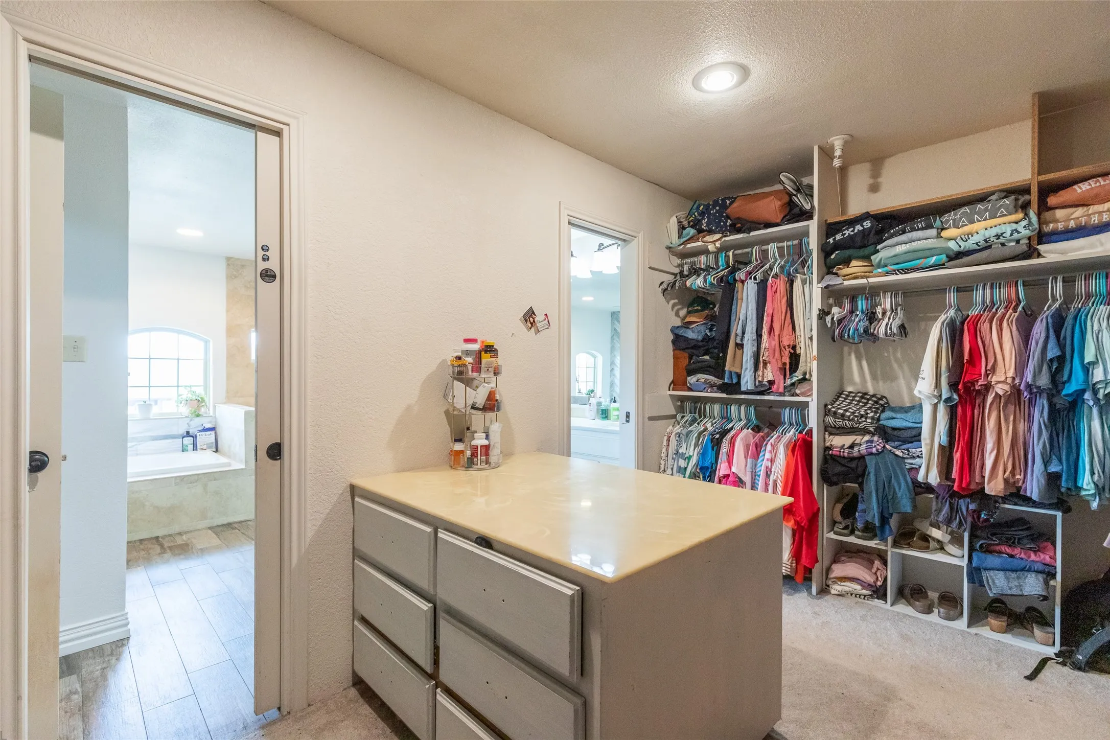 Built in dresser, his and her entries and incredible space in the primary closet