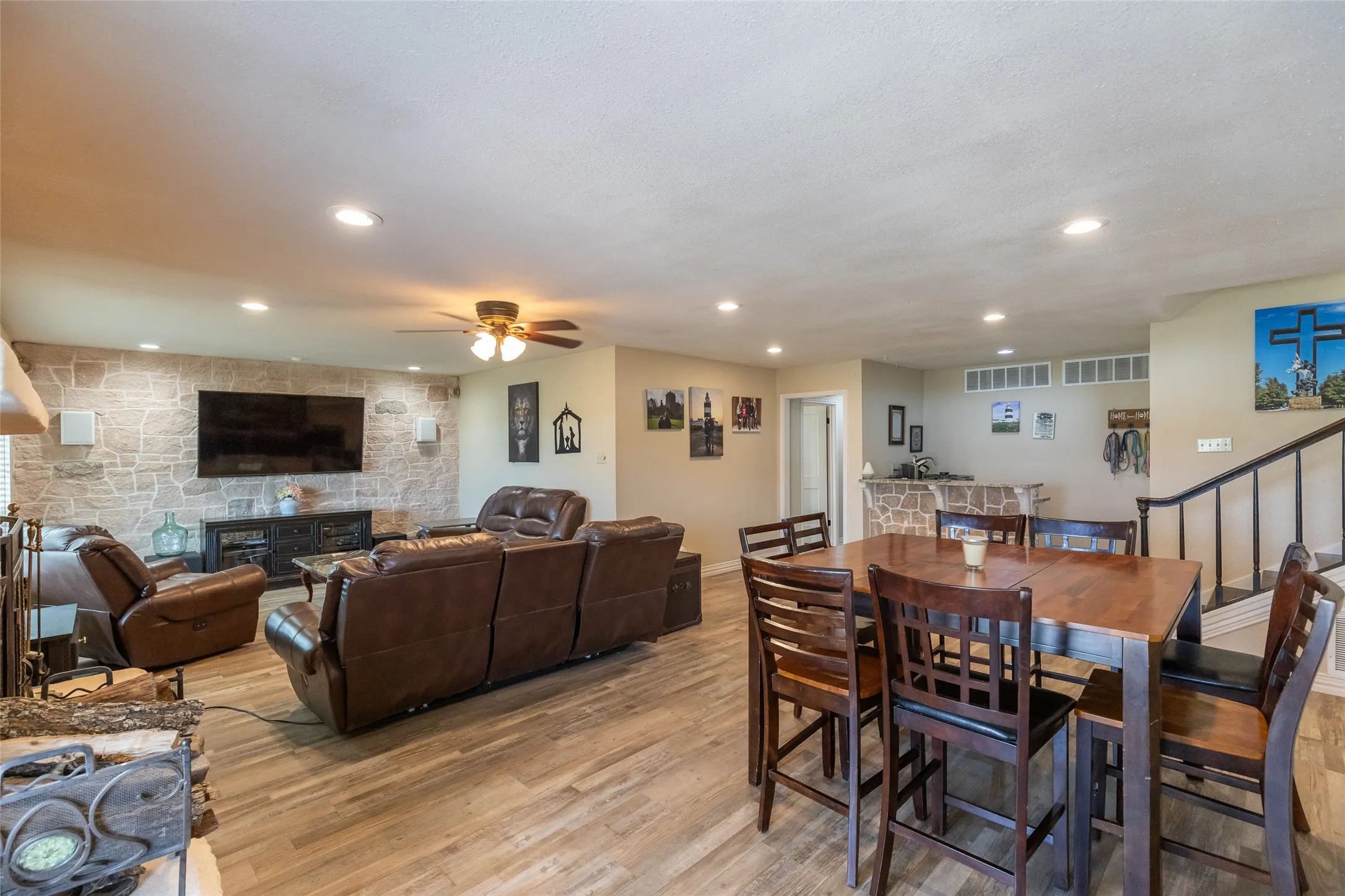 Second living area with fireplace, wet bar
and room for another dining area if desired.