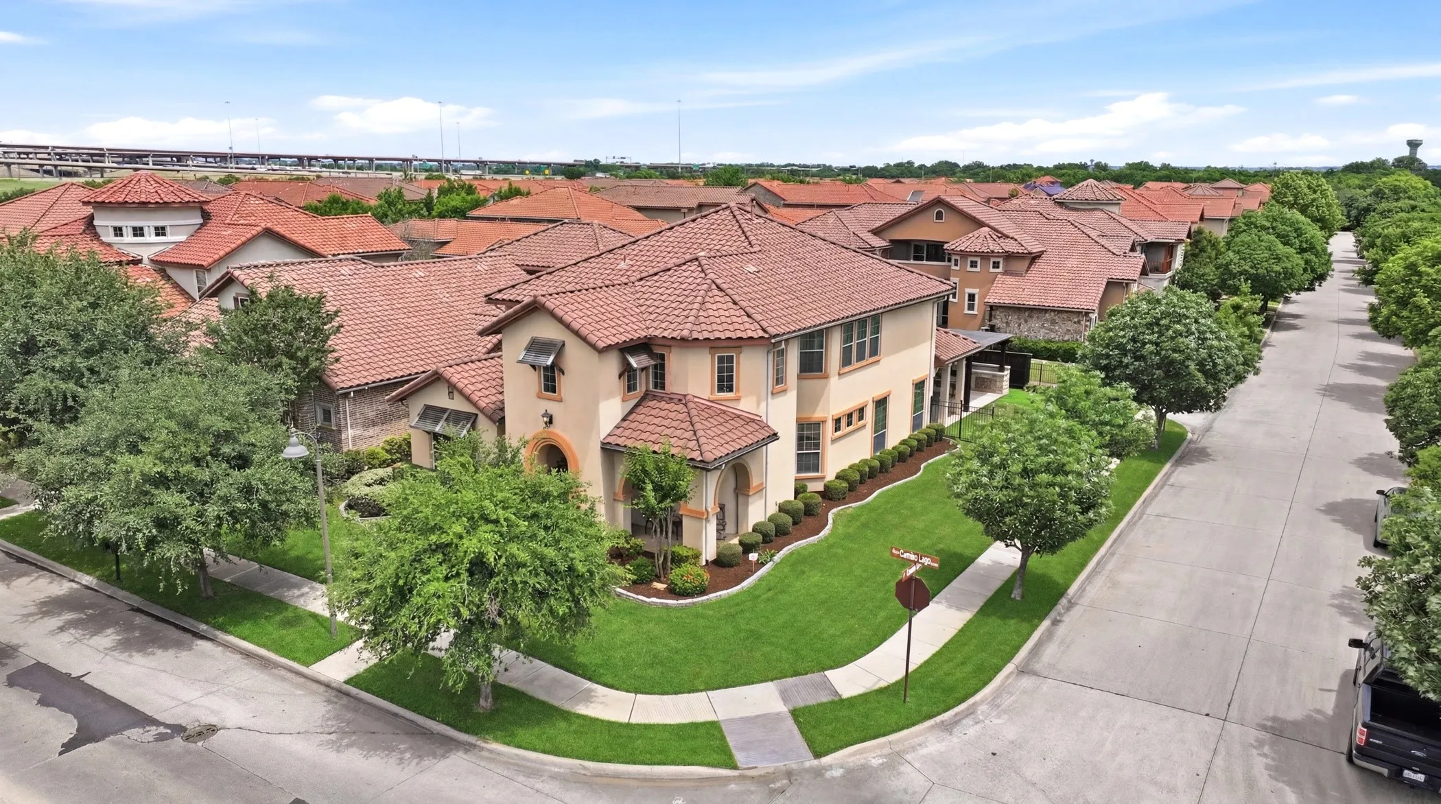 Desirable corner lot with lush landscaping.