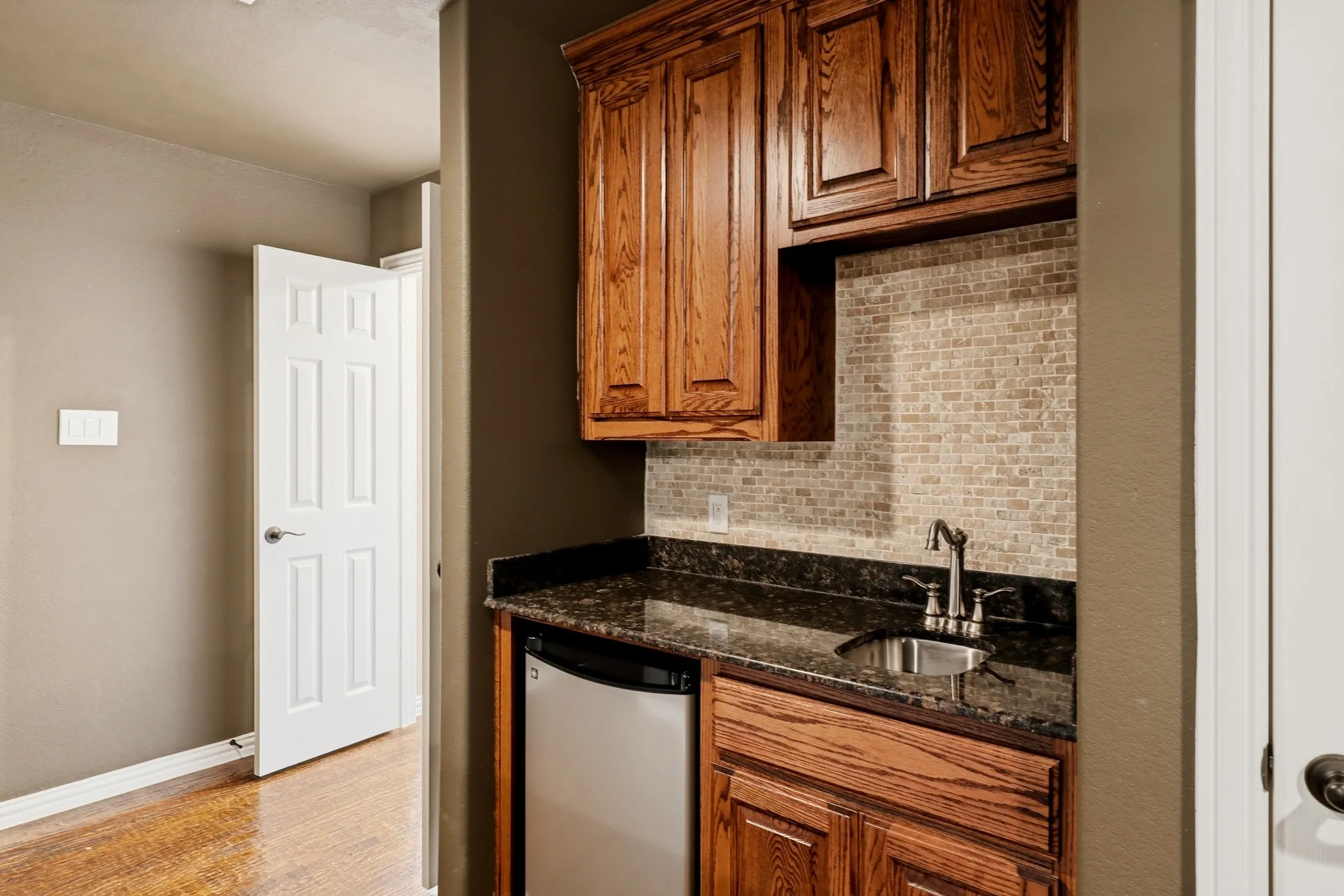 Wet bar in media room.
